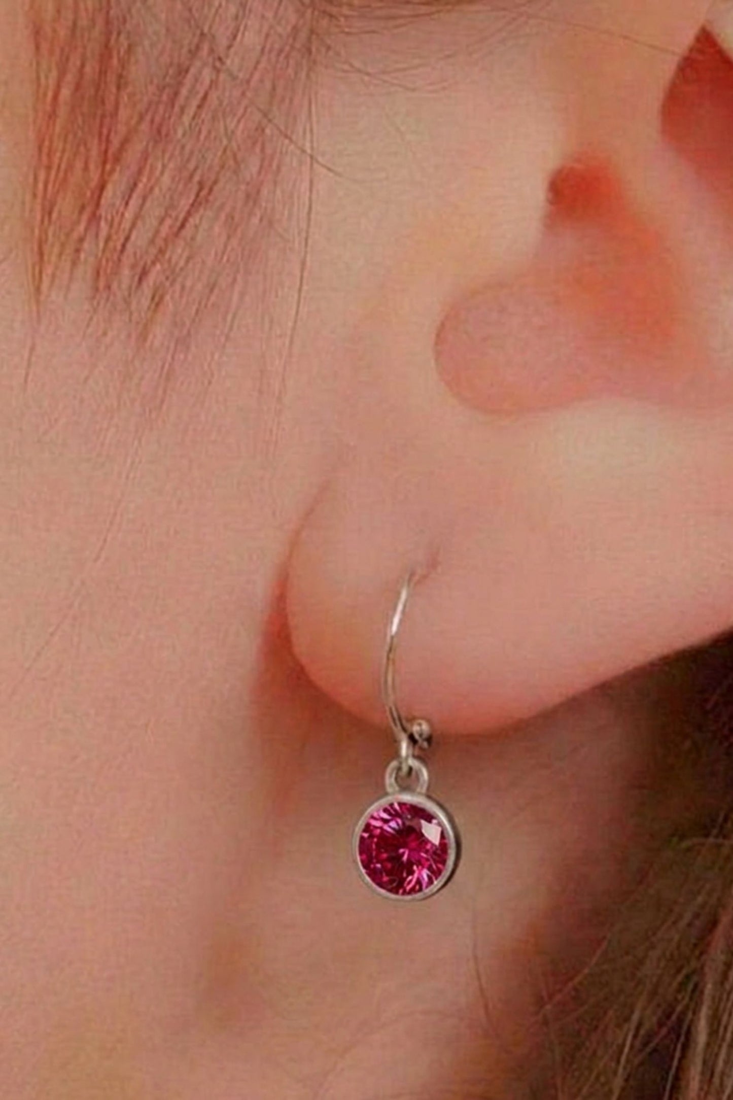 sterling-silver-cz-huggie-hoops-in-silver-fuchsia-model