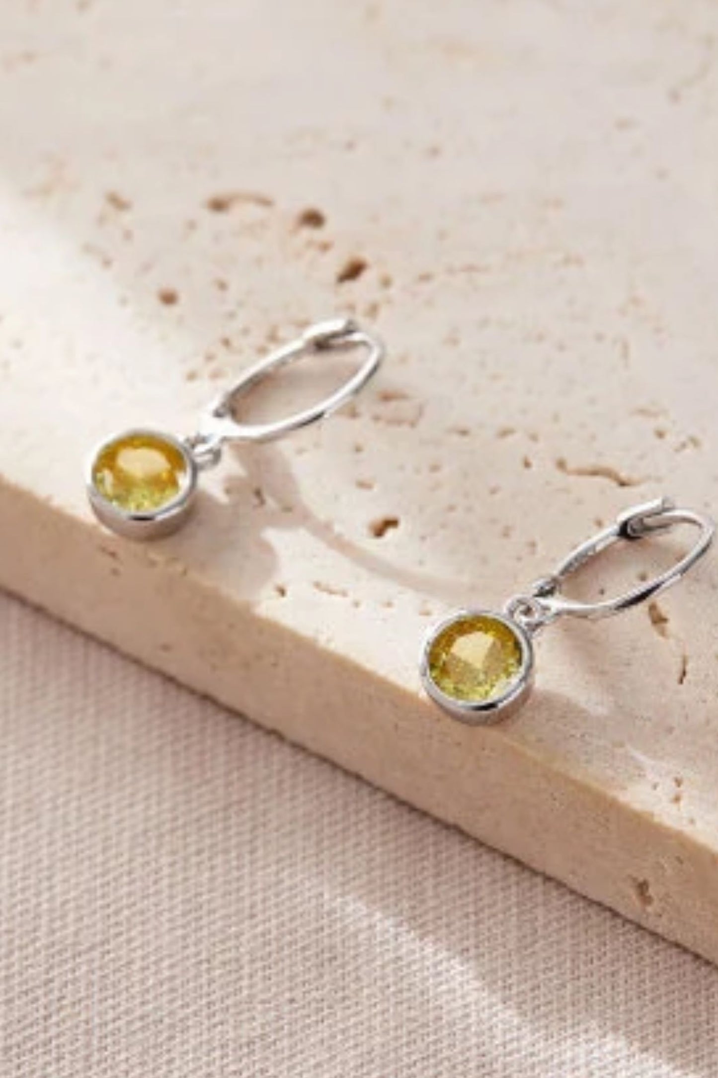 sterling-silver-cz-huggie-hoops-in-silver-yellow