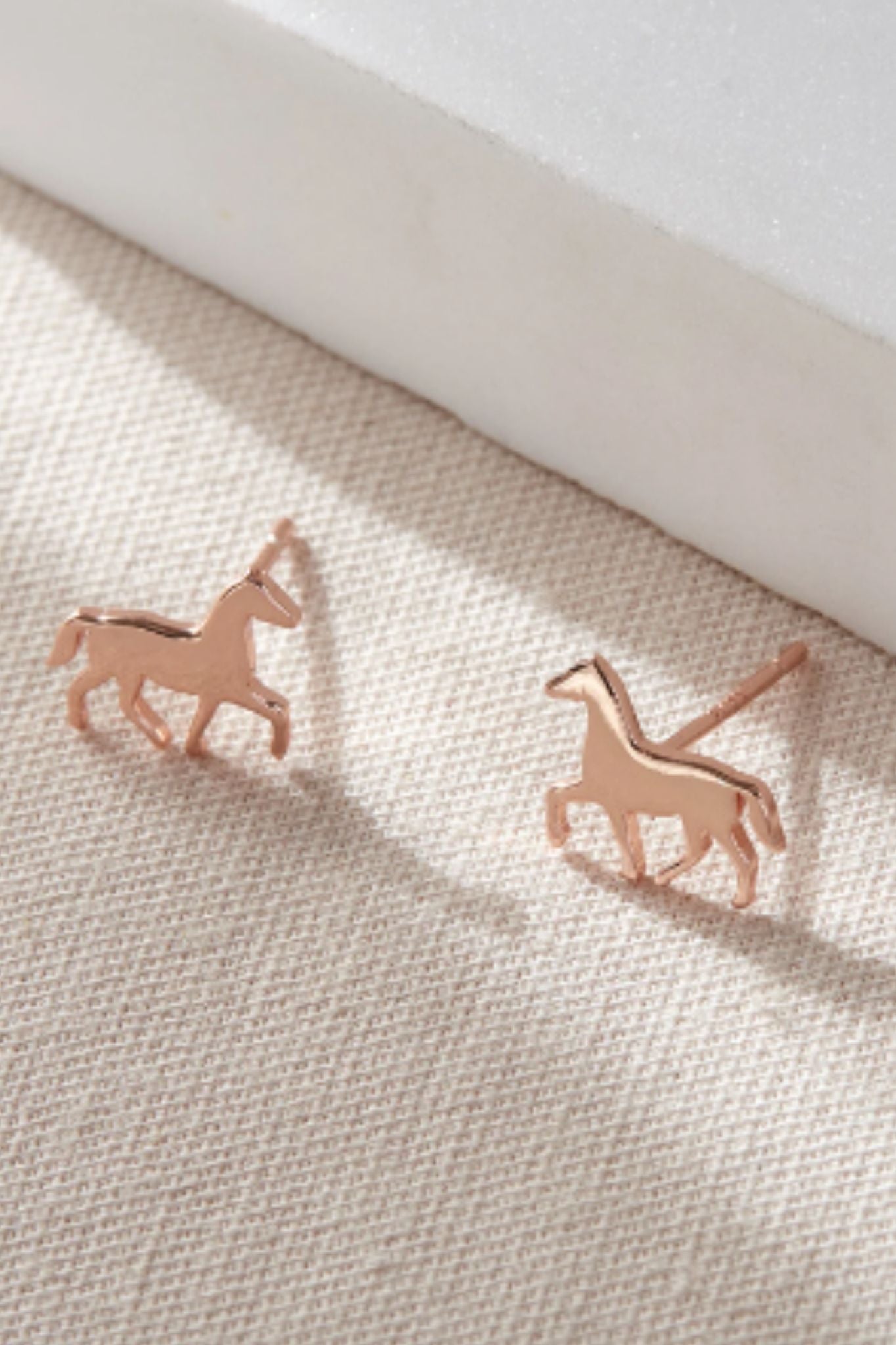 sterling-silver-horse-studs-in-rose-gold