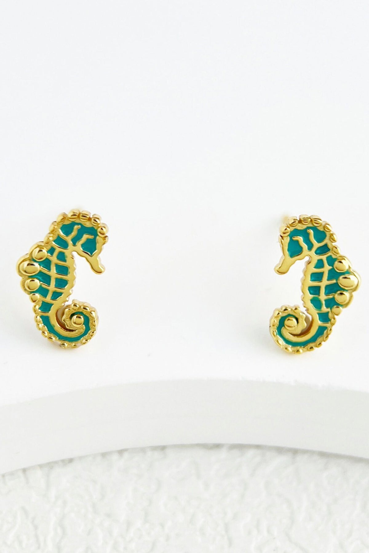 sterling-silver-seahorse-studs-in-gold