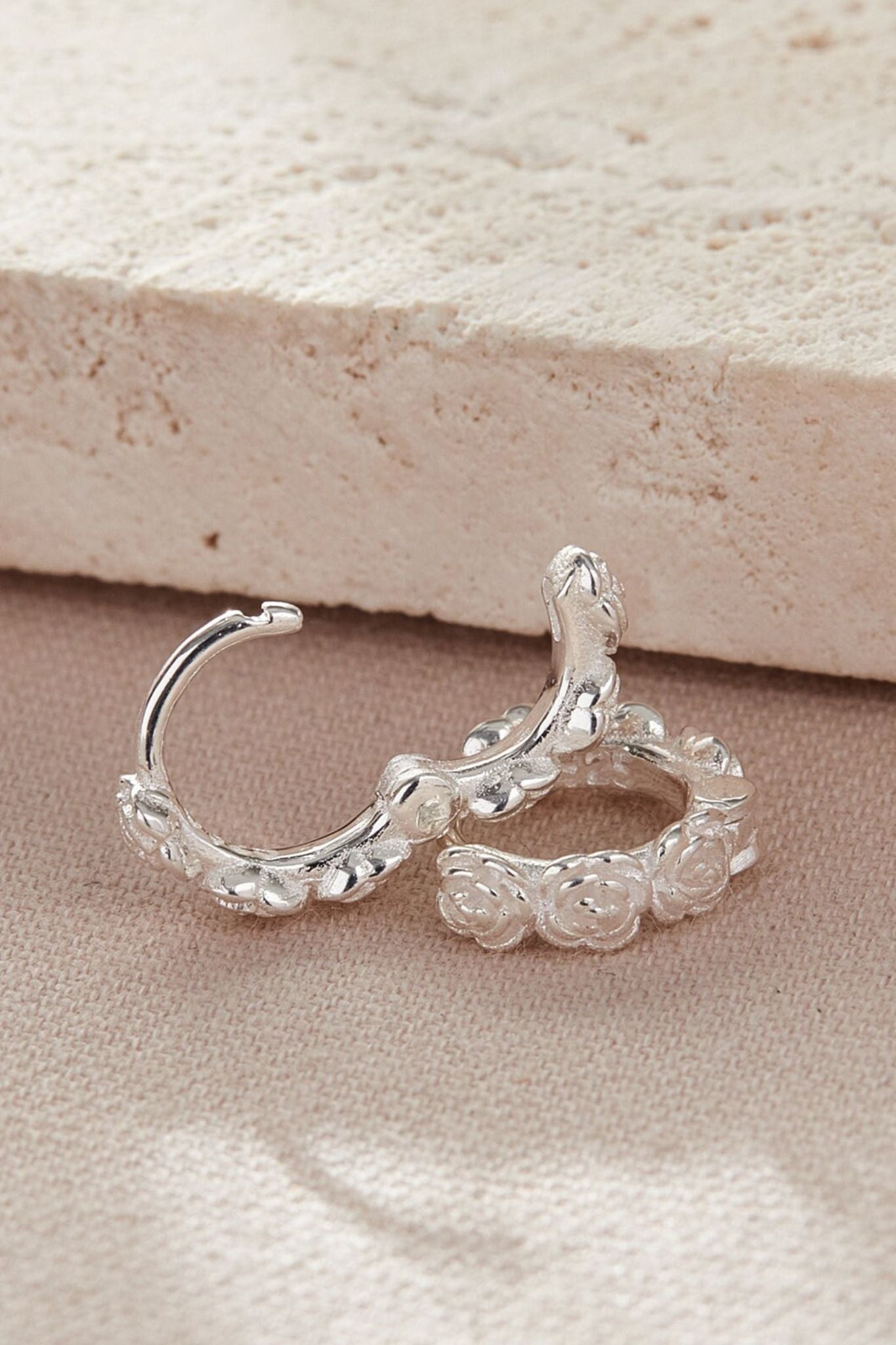 sterling-silver-rose-huggie-hoops-latch-closure