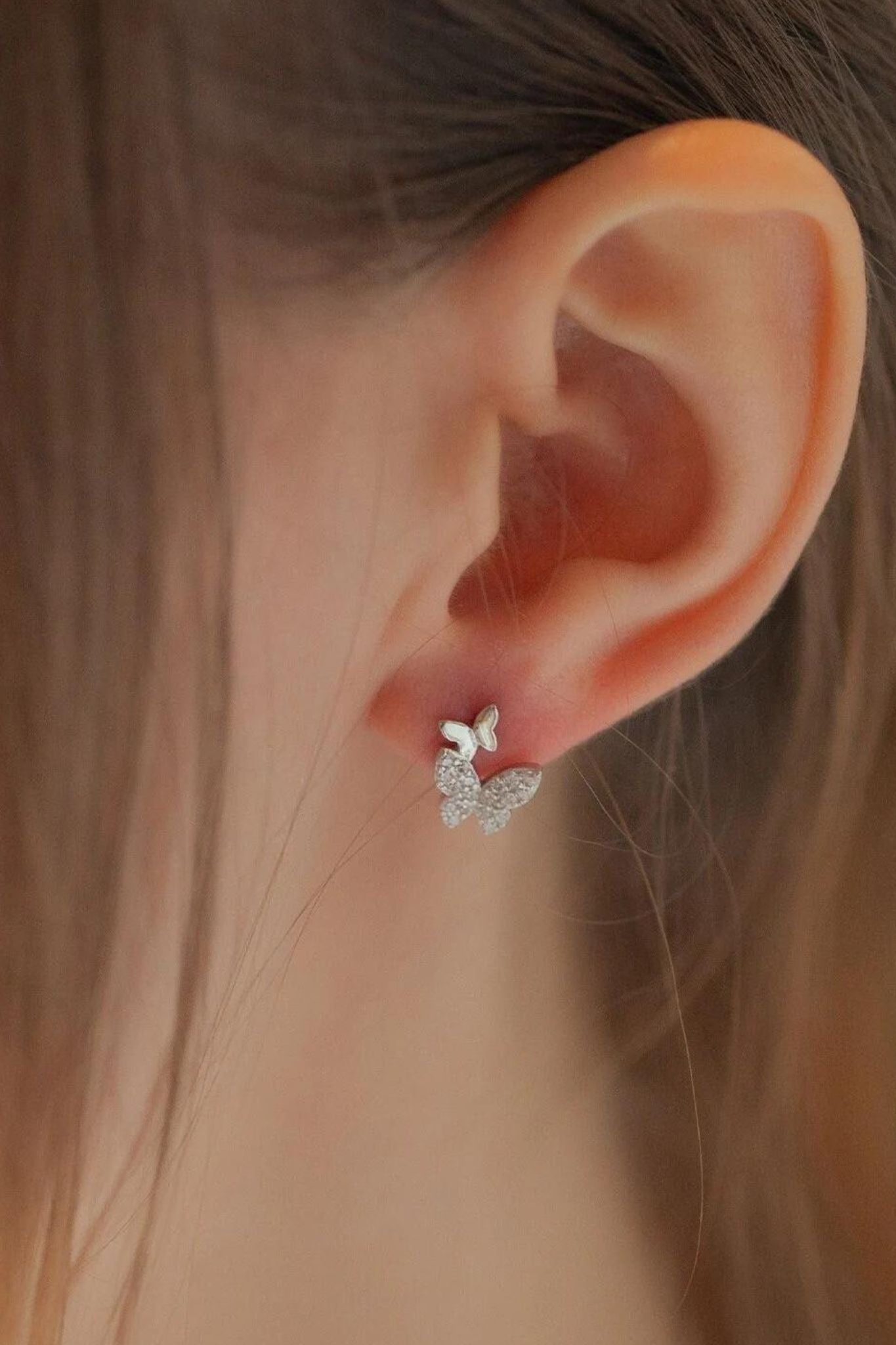 sterling-silver-sparkly-butterfly-studs-in-silver-model
