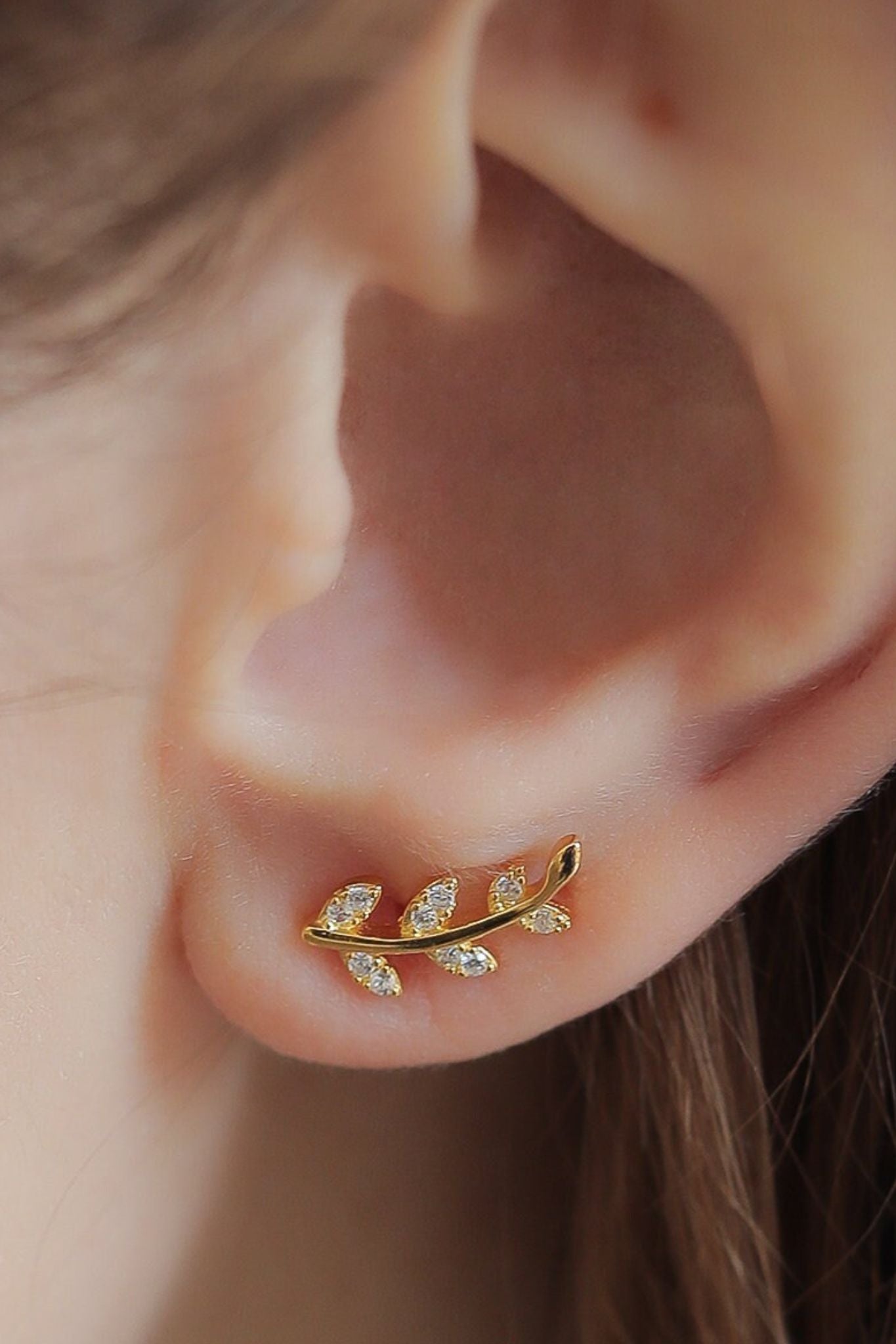 sterling-silver-cz-sparkly-leaf-studs-in-gold-model