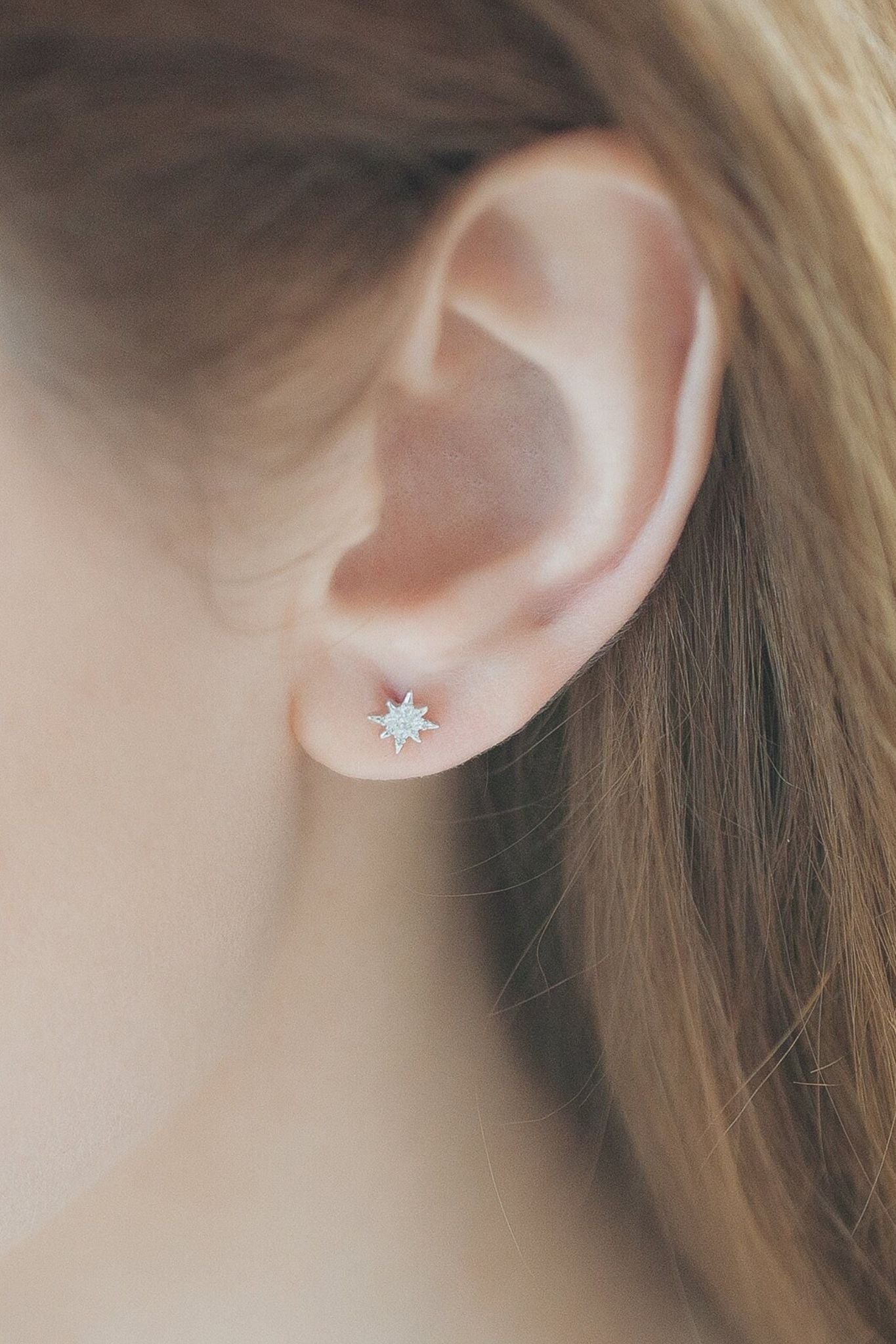 sterling-silver-cz-starburst-studs-in-silver-model