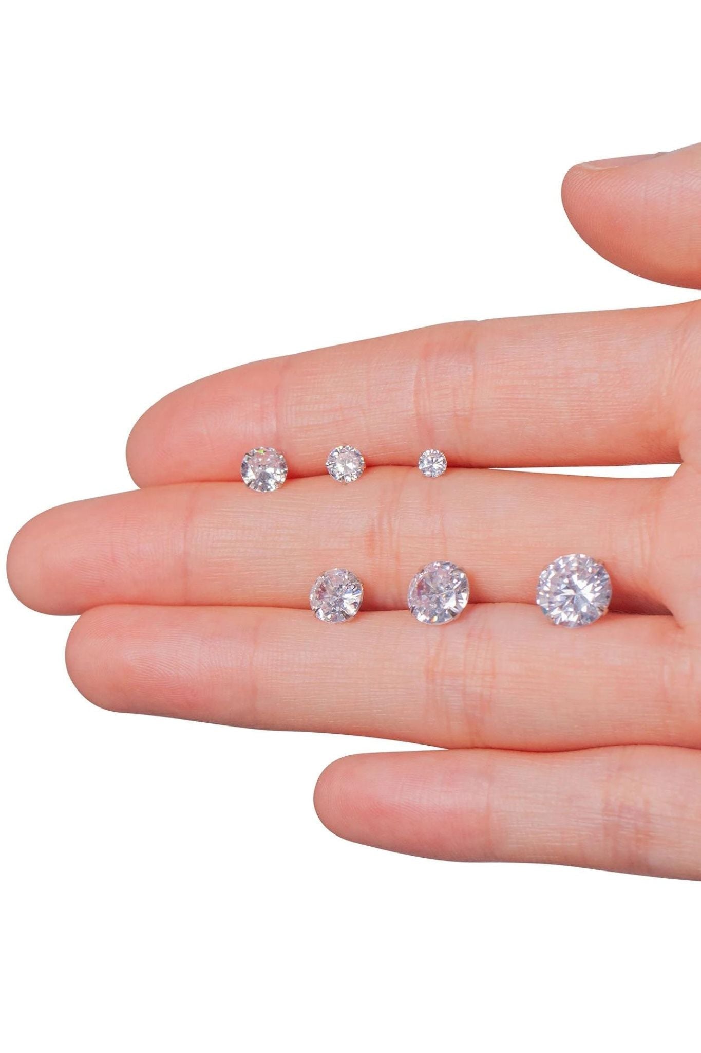 sterling-silver-cz-sparkly-studs-various-sizes-in-hand