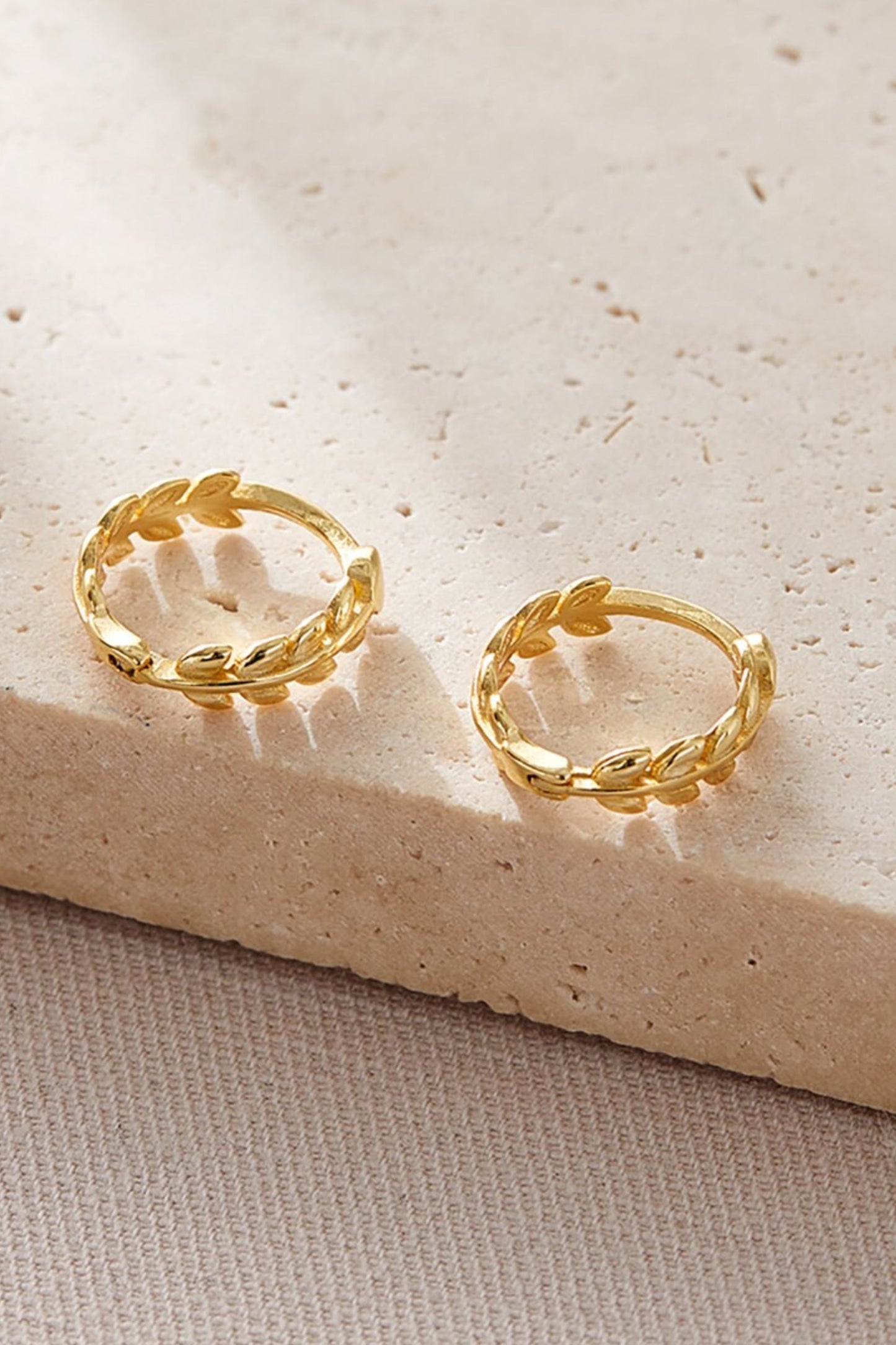 sterling-silver-olive-leaf-huggie-hoops-in-gold-pair