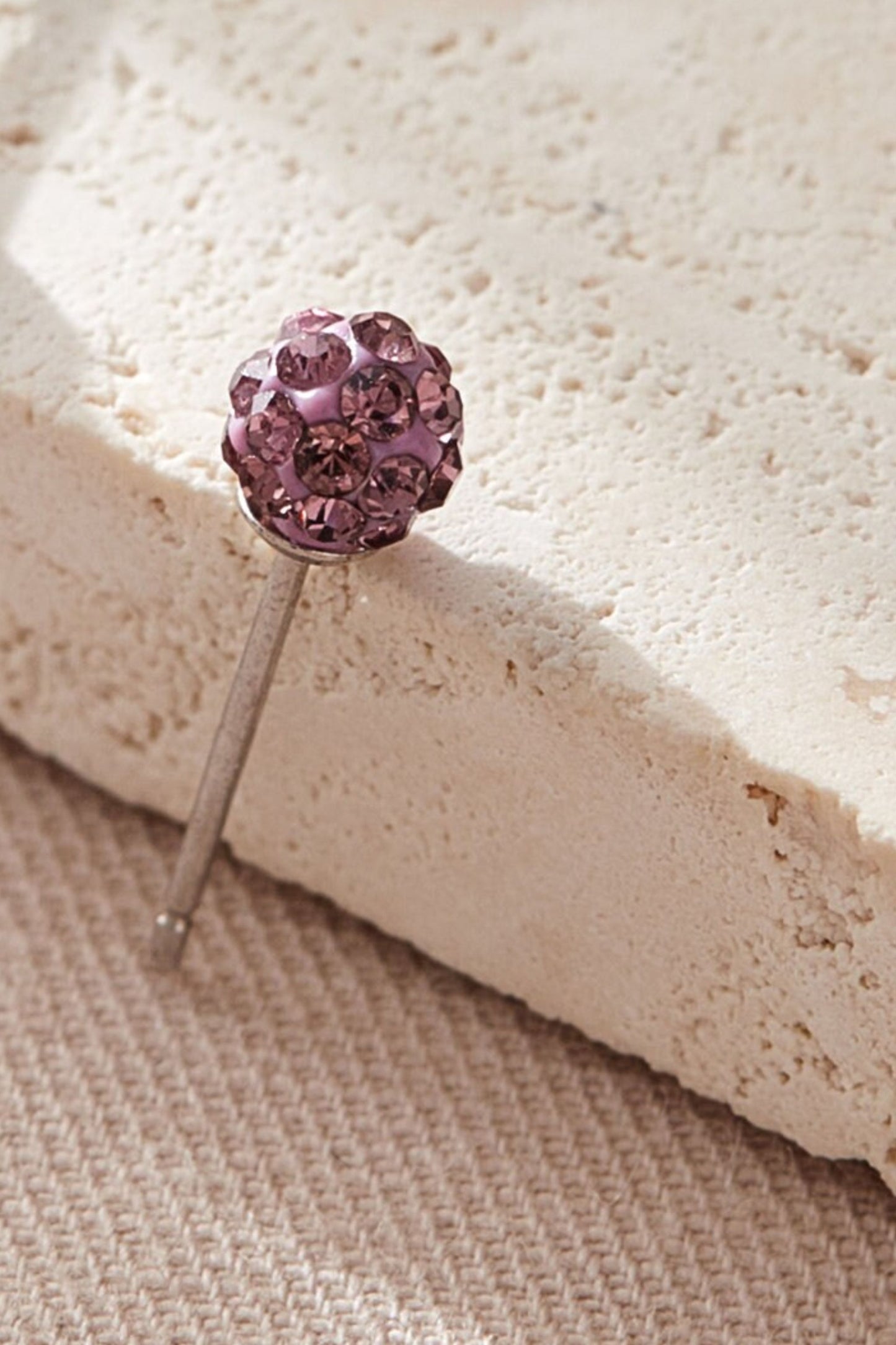 sterling-silver-cz-disco-ball-studs-in-purple-closeup