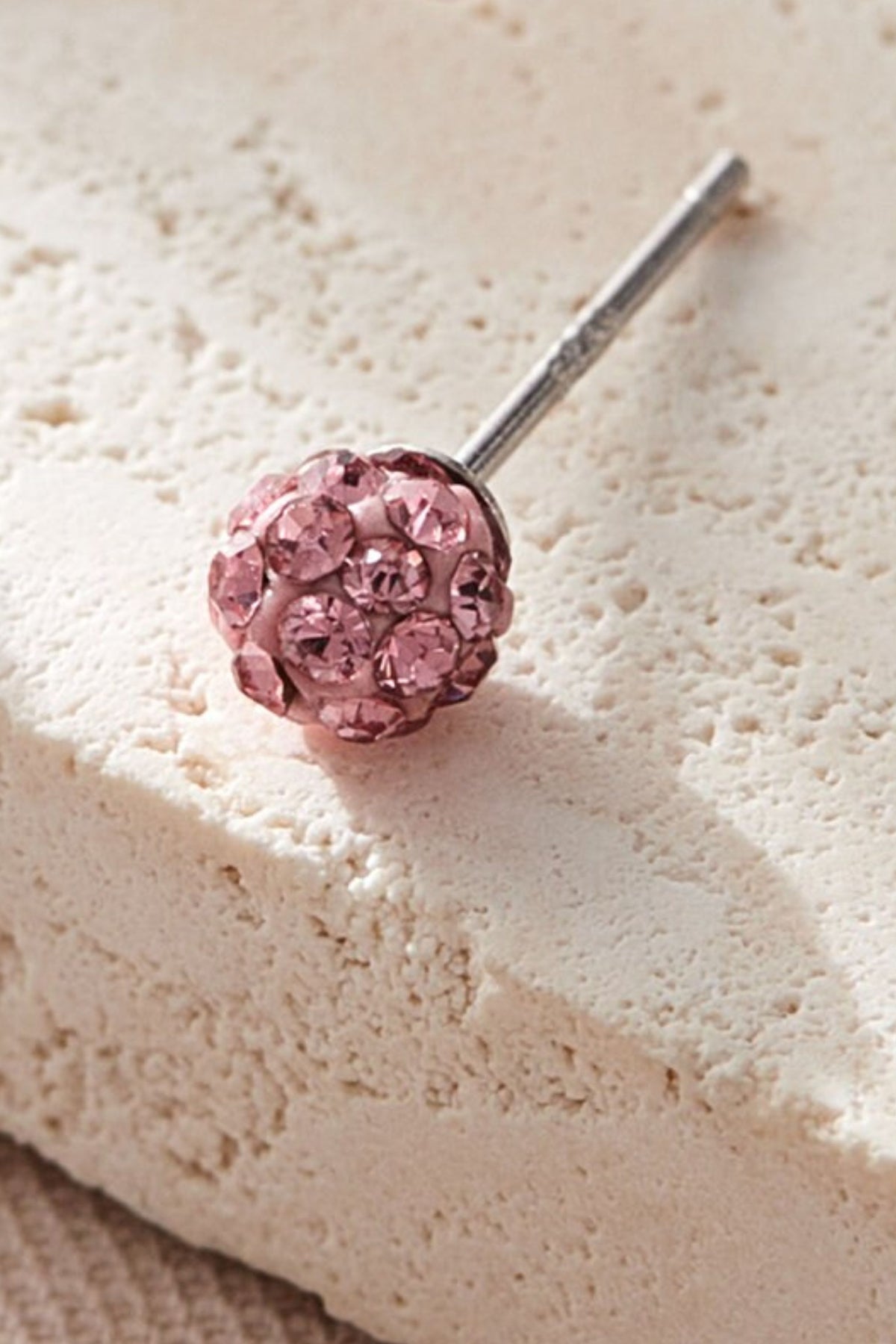 sterling-silver-cz-disco-ball-studs-in-pink-closeup