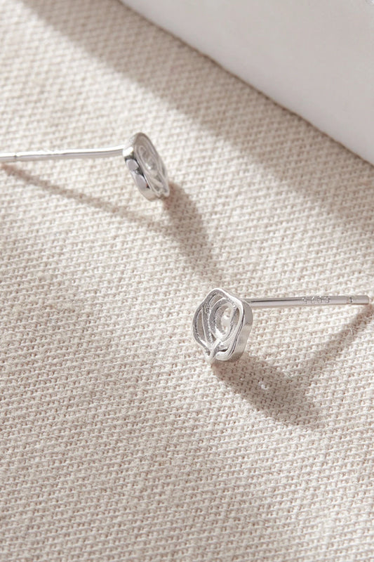 sterling-silver-rose-floral-studs-in-silver-closeup