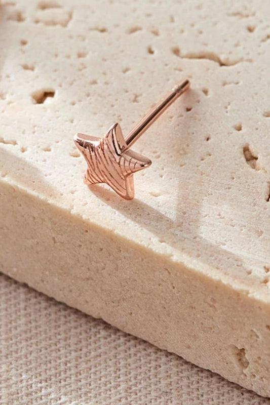 sterling-silver-zebra-stripe-star-studs-in-rose-gold-closeup