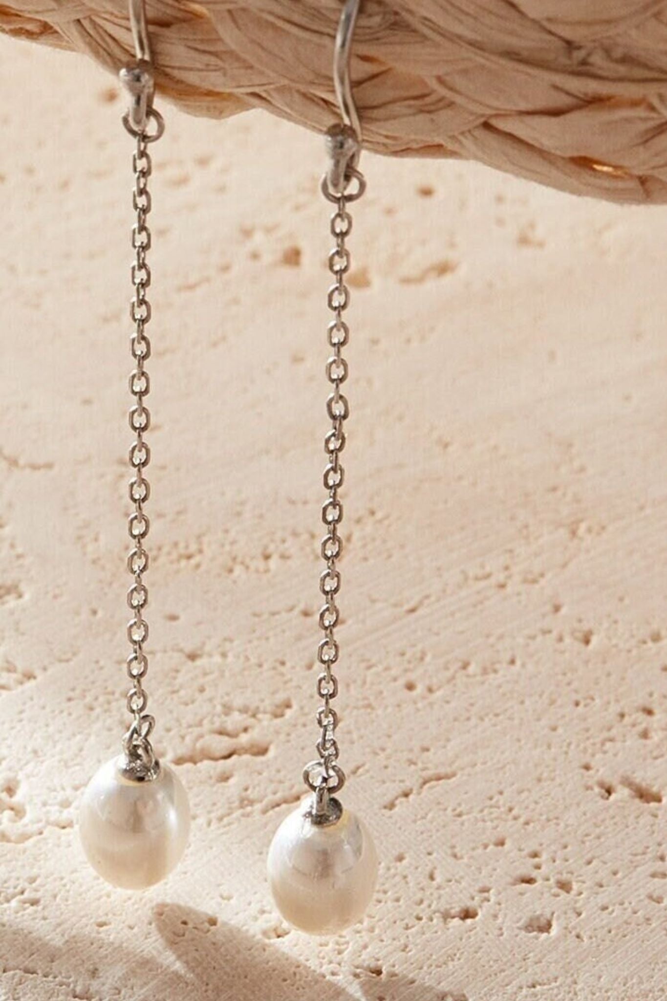 sterling-silver-pearl-drop-earrings-in-silver-closeup