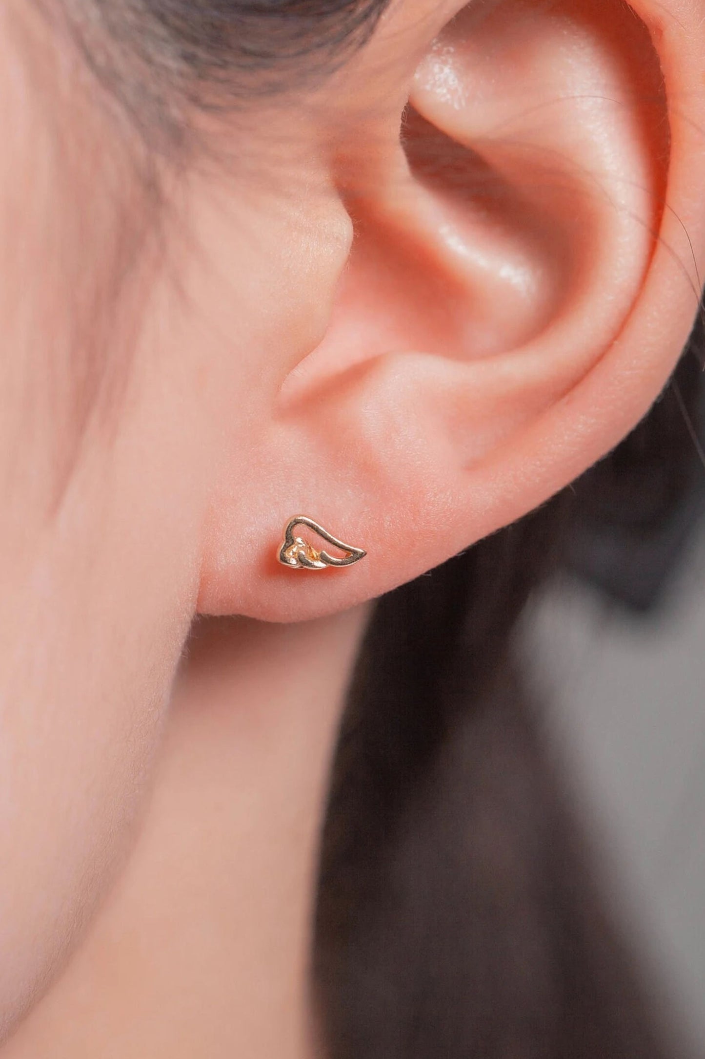 dainty-angel-wings-studs-in-gold-model