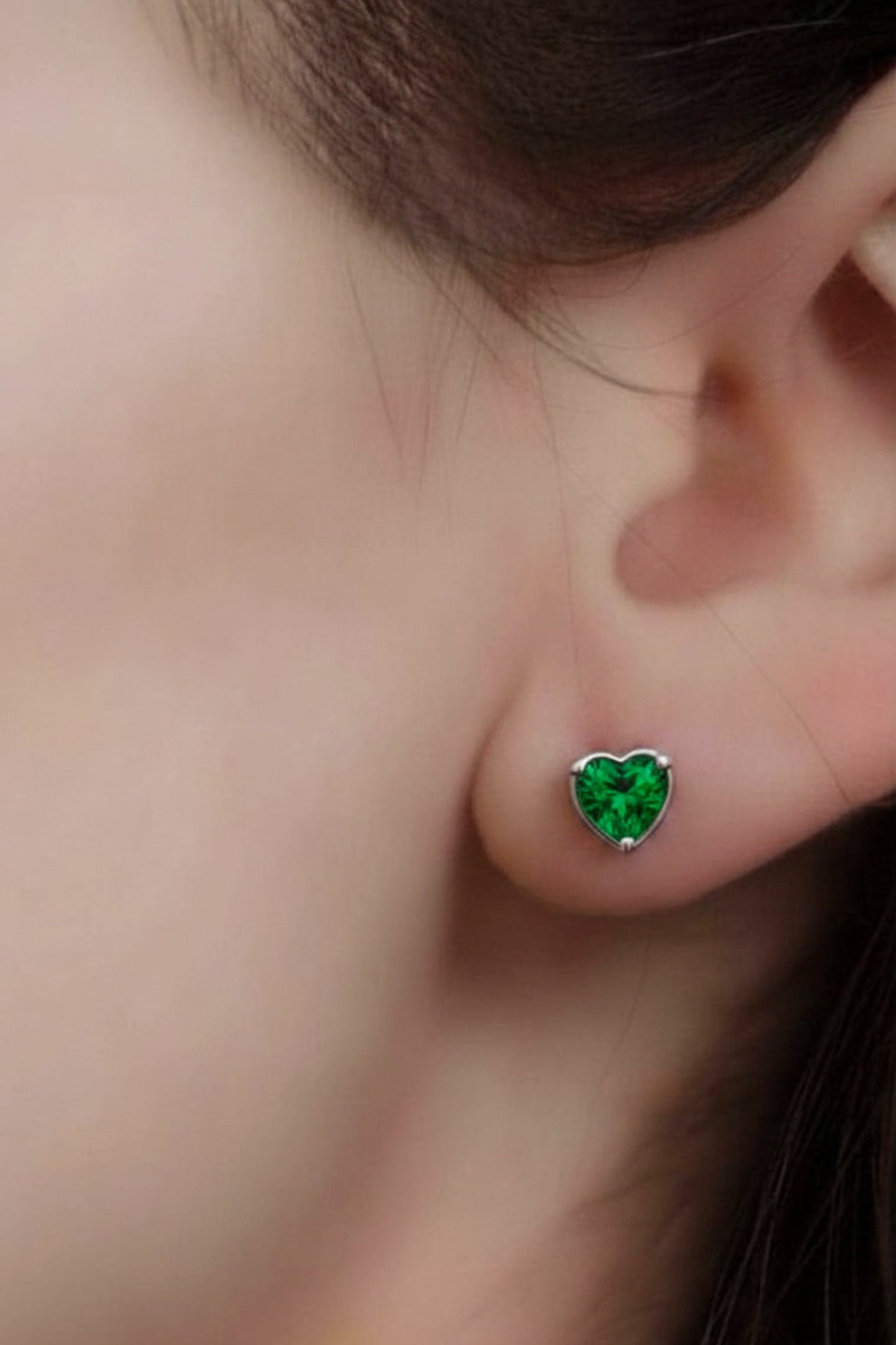 sterling-silver-cz-heart-studs-in-silver-green-model