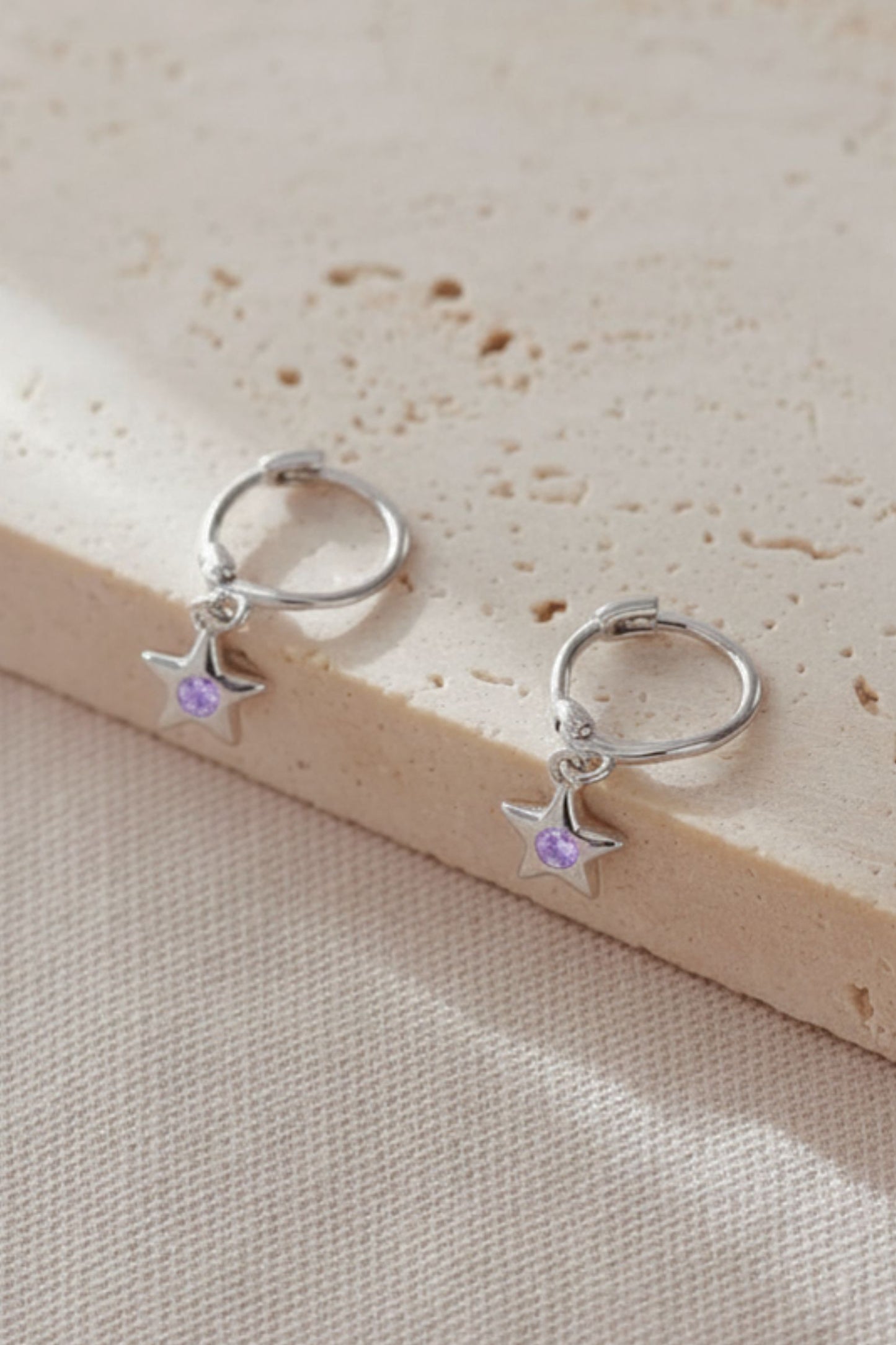 sterling-silver-cz-star-hoops-in-silver-lilac