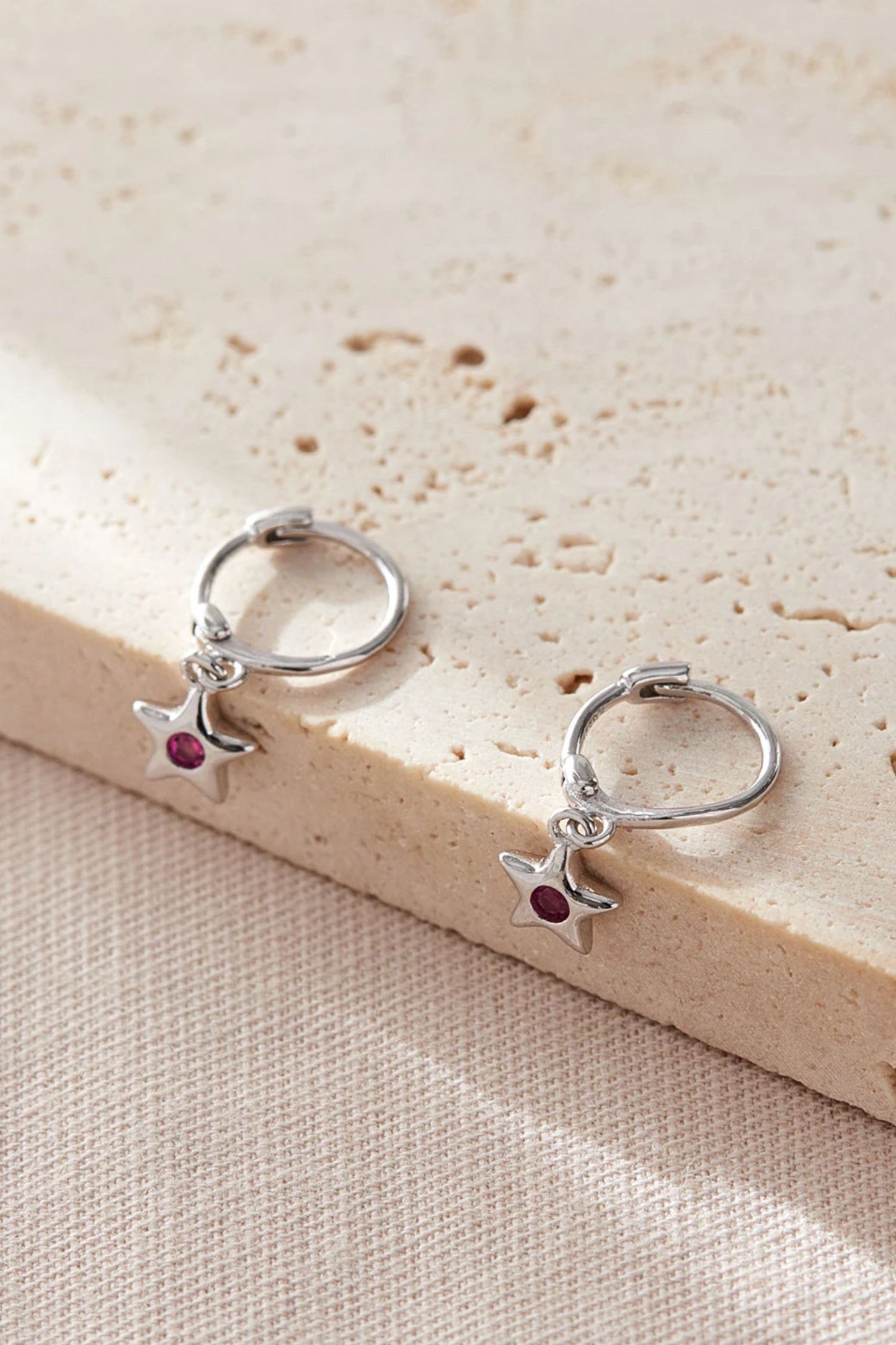 sterling-silver-cz-star-hoops-in-silver-fuchsia