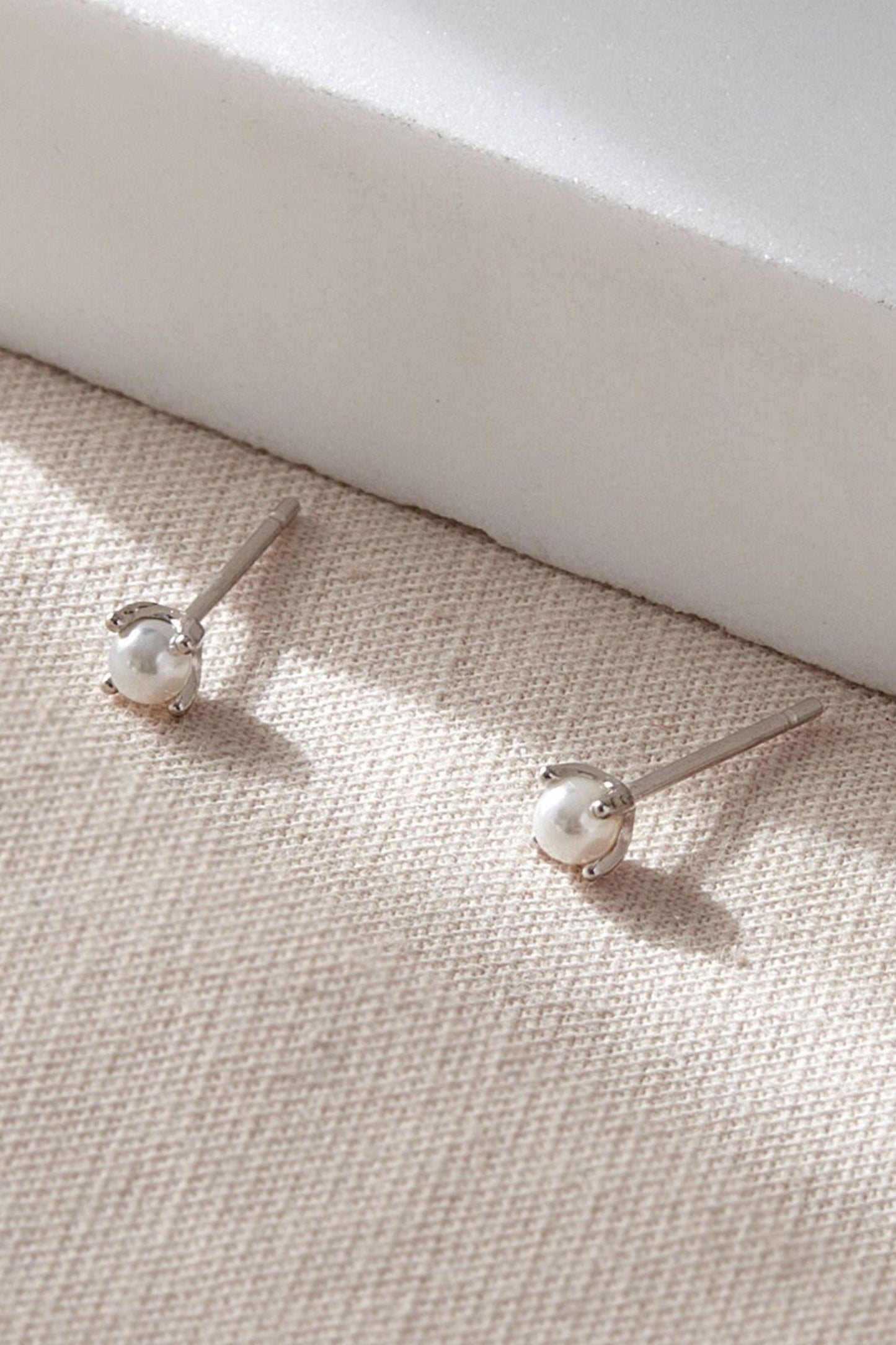 sterling-silver-pearl-studs-4mm-in-silver