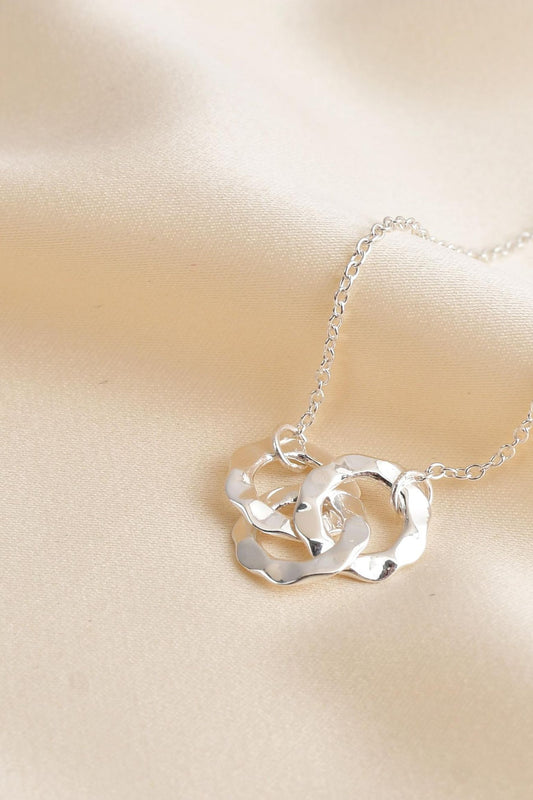 sterling-silver-hammered-circle-trio-bracelet-closeup