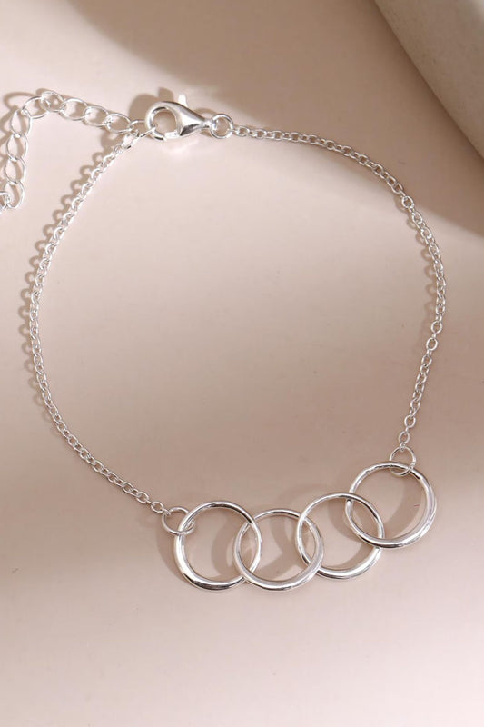 sterling-silver-four-rings-bracelet-lying-flat