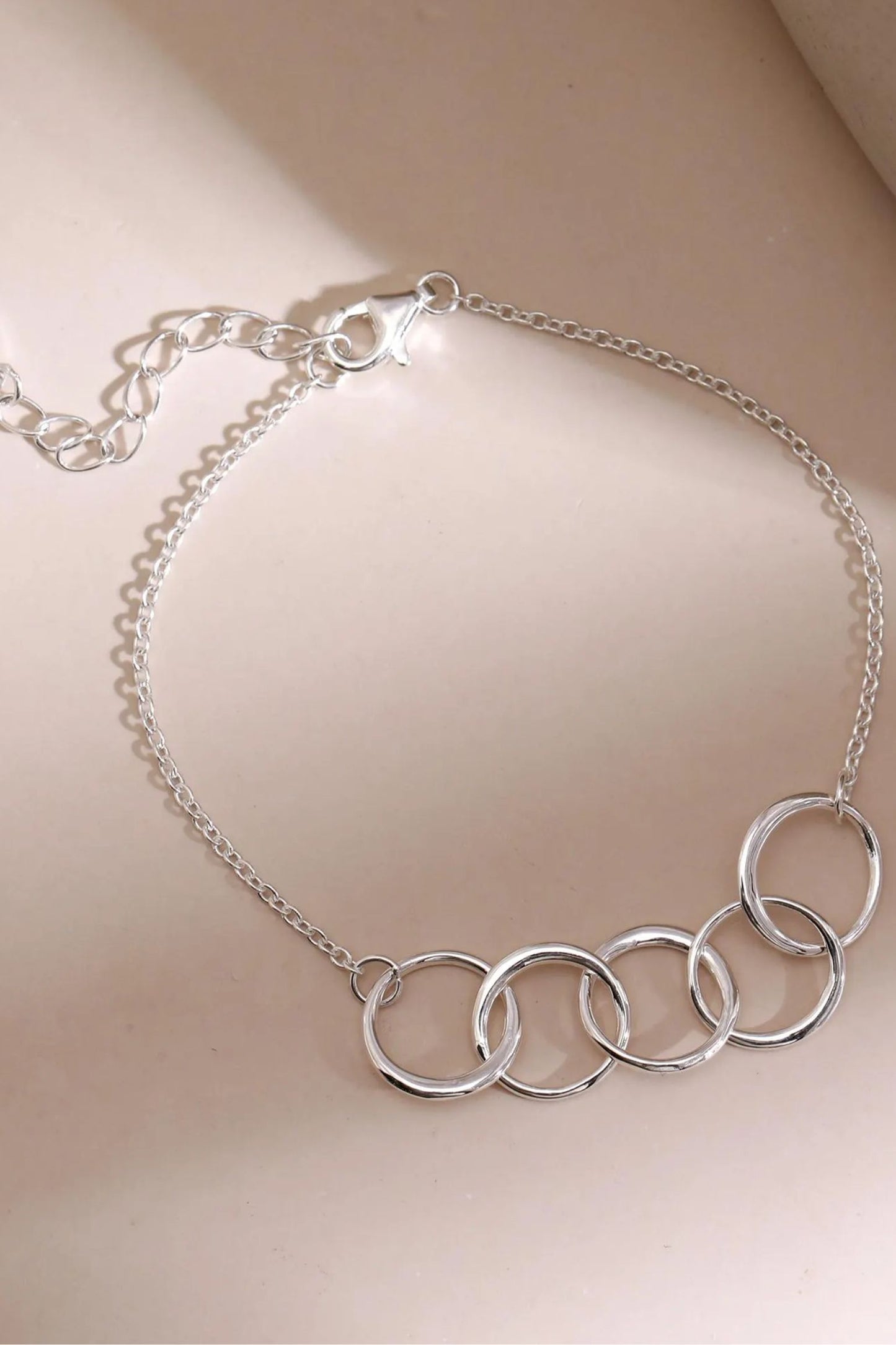 sterling-silver-five-rings-bracelet-lying-flat