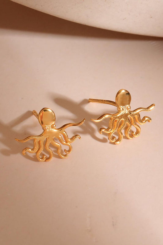 sterling-silver-octopus-studs-in-gold-closeup