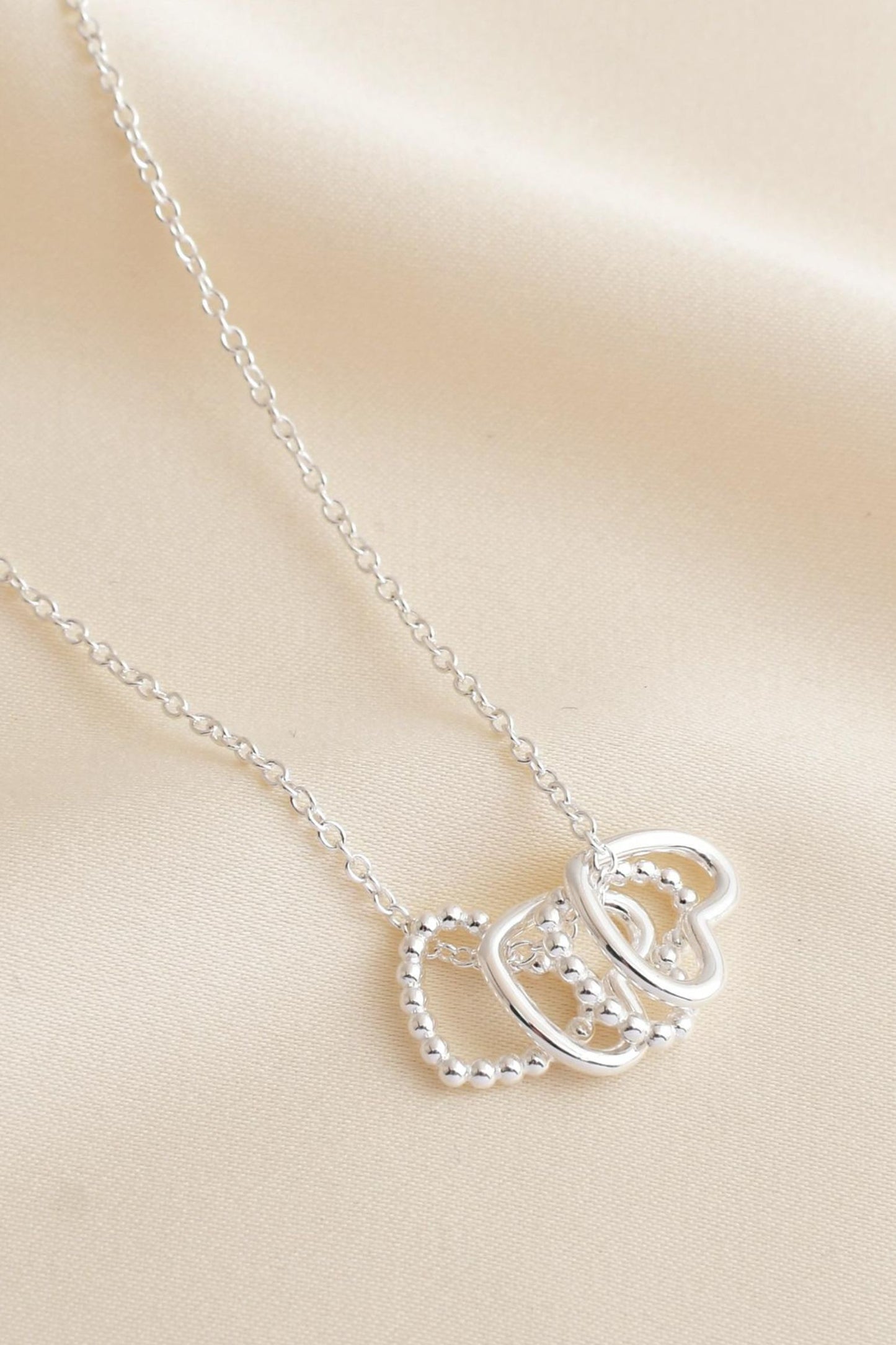 sterling-silver-four-love-hearts-necklace-four-hoops