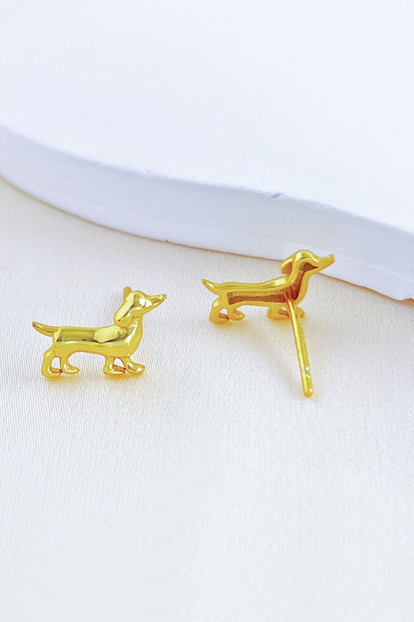 sterling-silver-sausage-dog-studs-in-gold-back