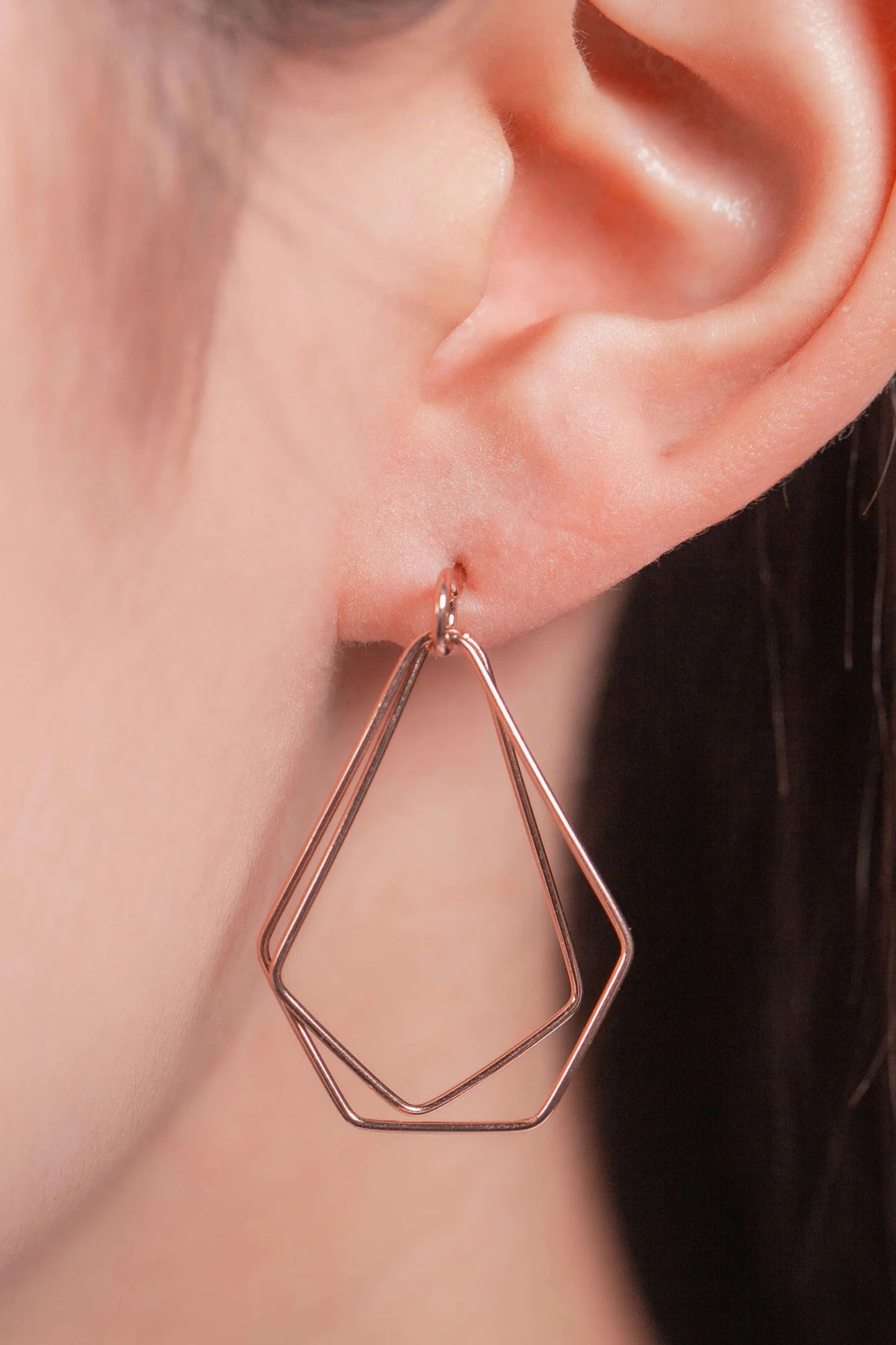 sterling-silver-geometric-dangle-earrings-in-rose-gold-model