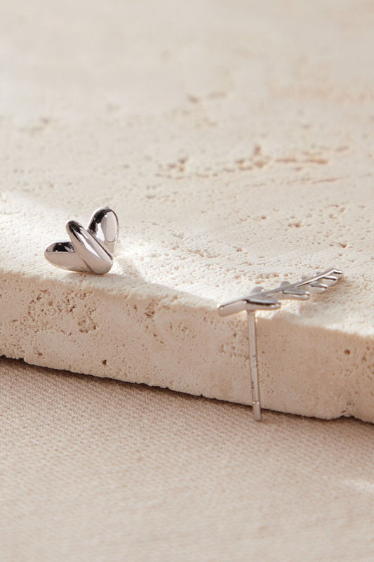 sterling-silver-mismatched-leaf-studs-in-silver-closeup