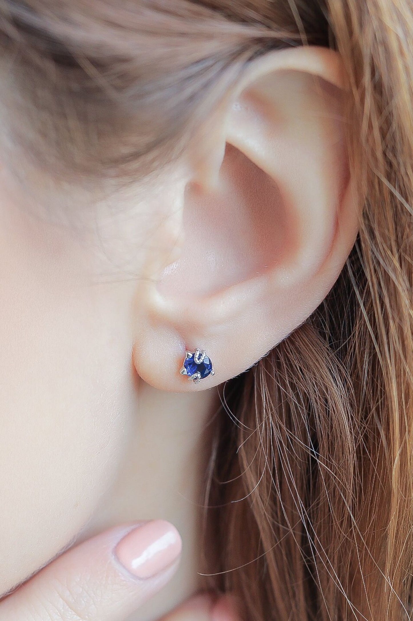 sterling-silver-cz-cat-studs-in-silver-blue-model