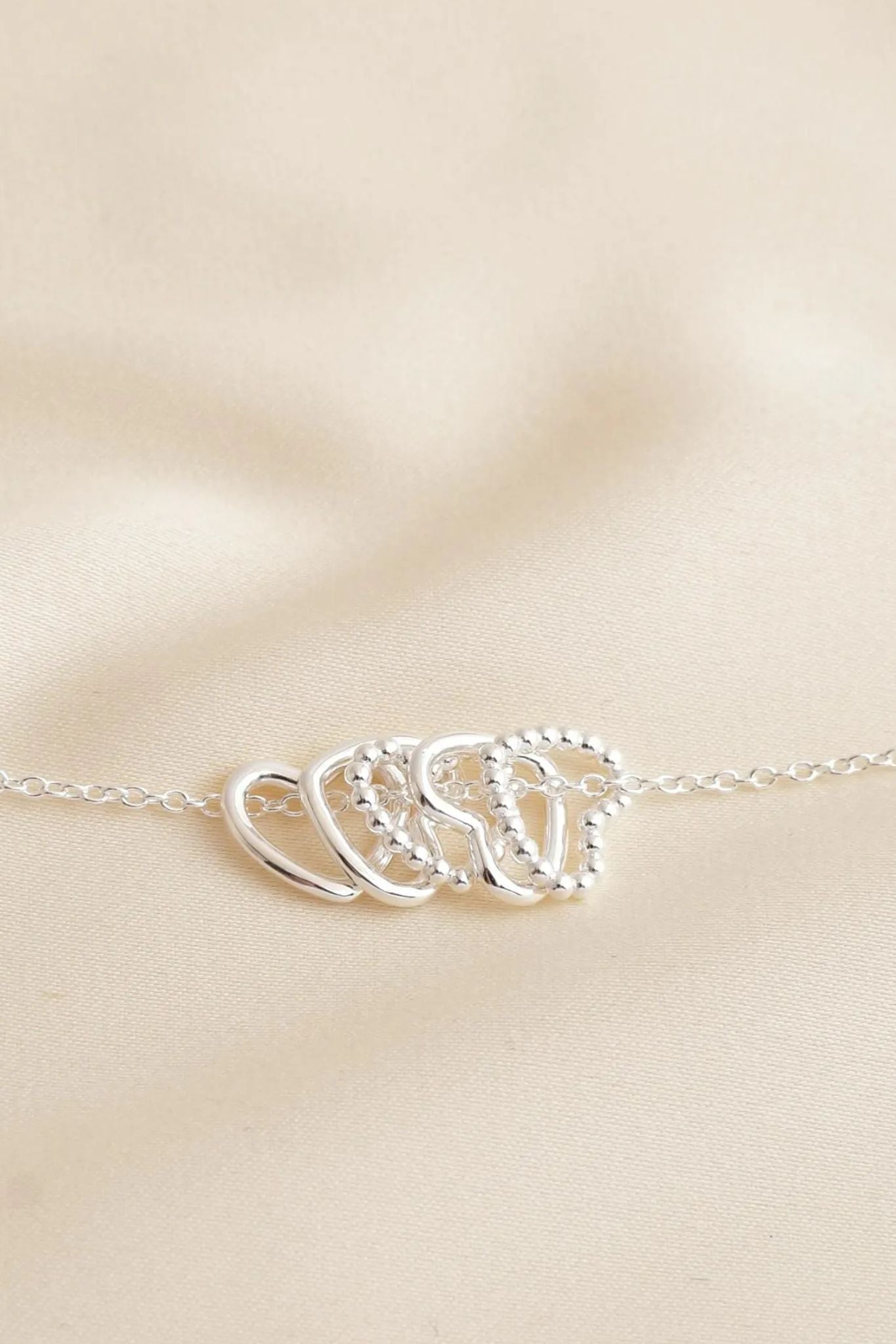 sterling-silver-five-hearts-necklace-50th-closeup
