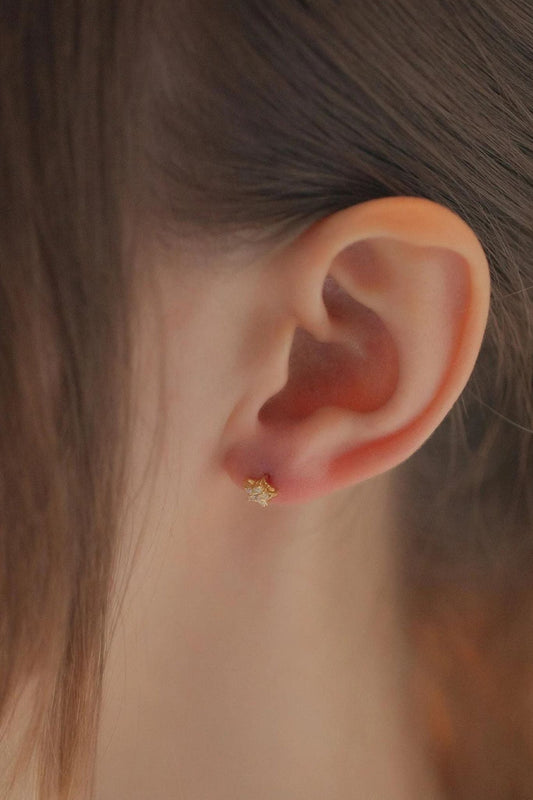 sterling-silver-cz-dainty-star-studs-in-gold-model