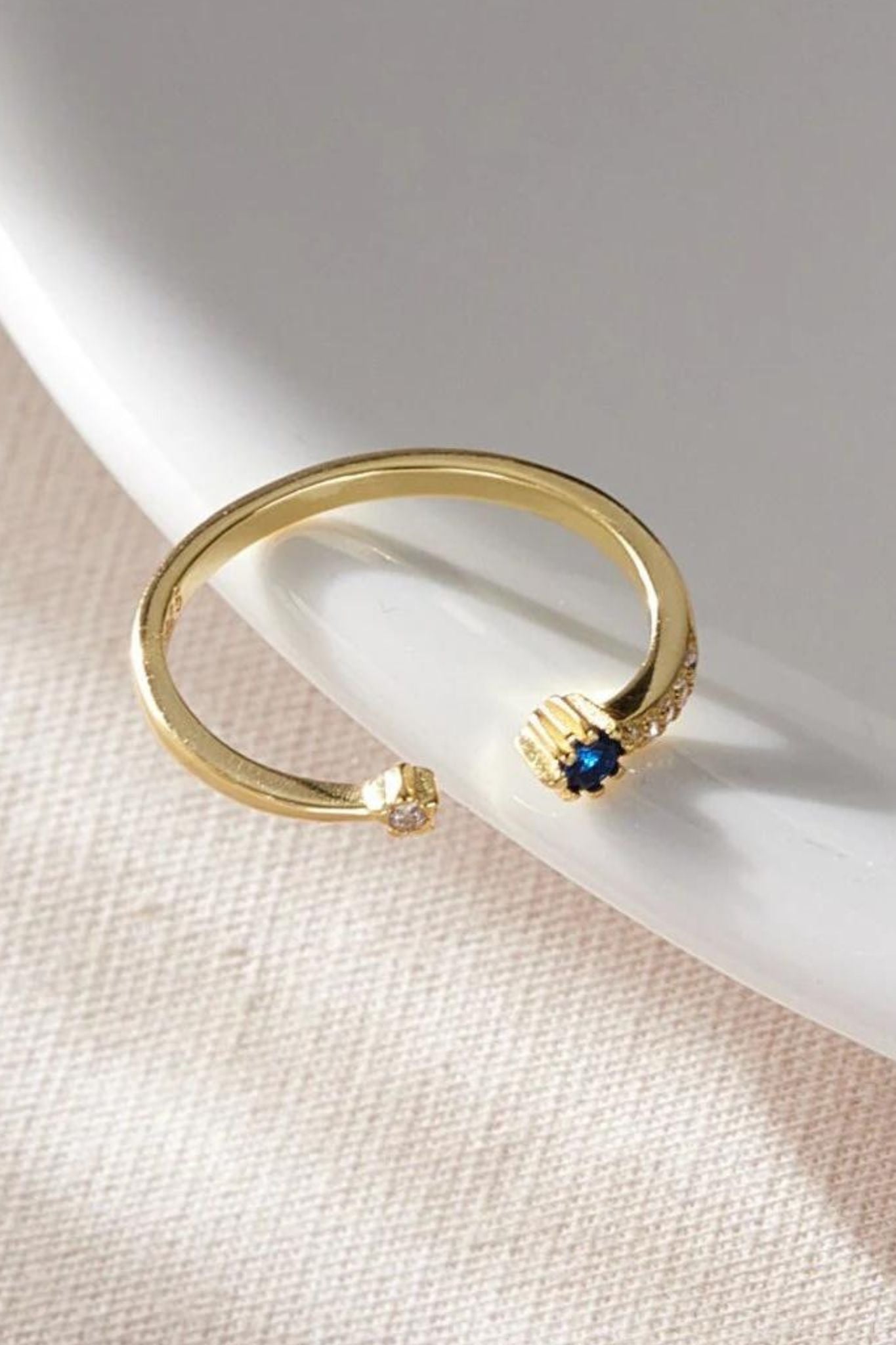 sterling-silver-blue-zircon-ring-lying-flat