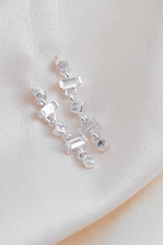 sterling-silver-cz-drop-earrings-lying-flat
