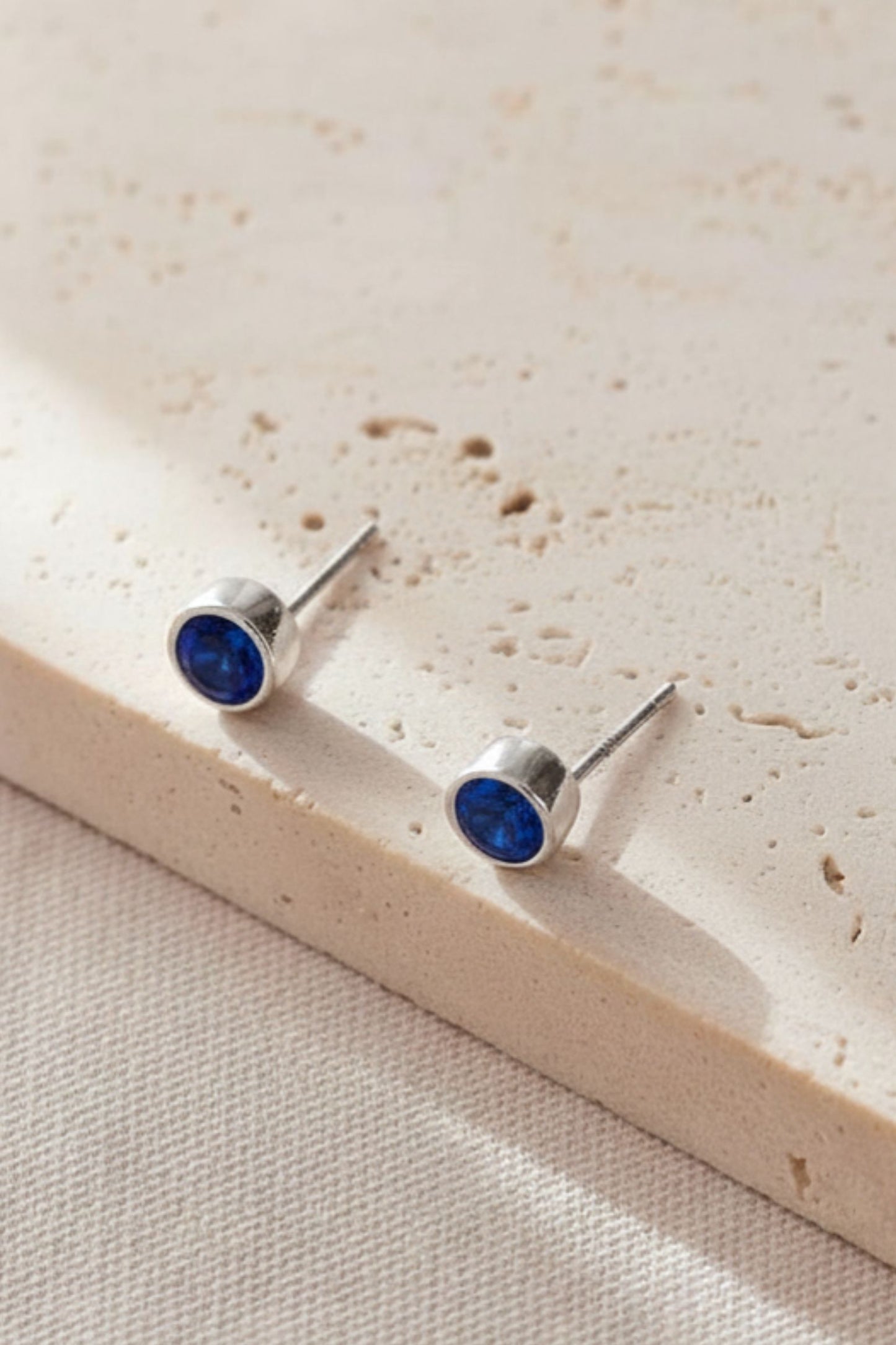 sterling-silver-cz-round-studs-in-silver-blue