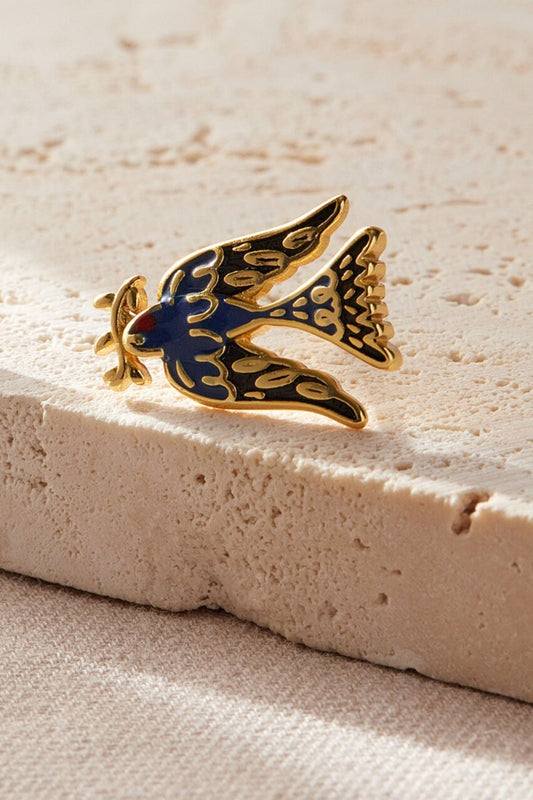 sterling-silver-dove-of-peace-earrings-in-gold-closeup