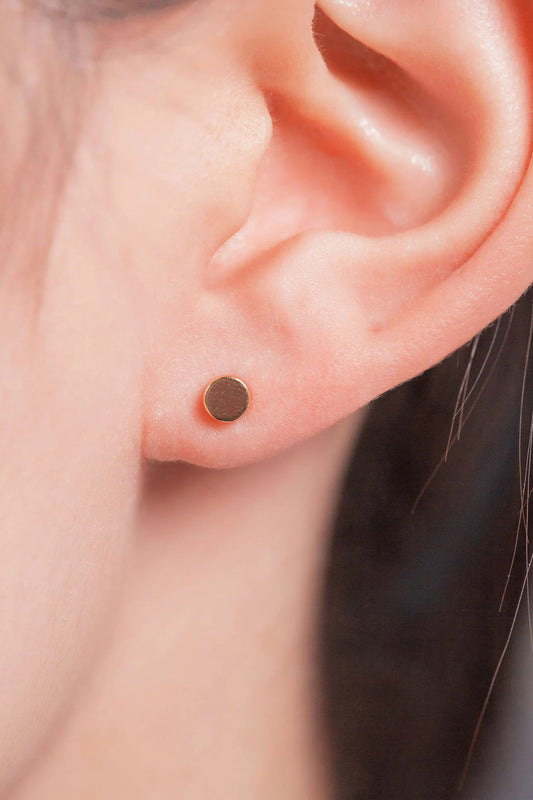 sterling-silver-tiny-disc-studs-in-gold-model