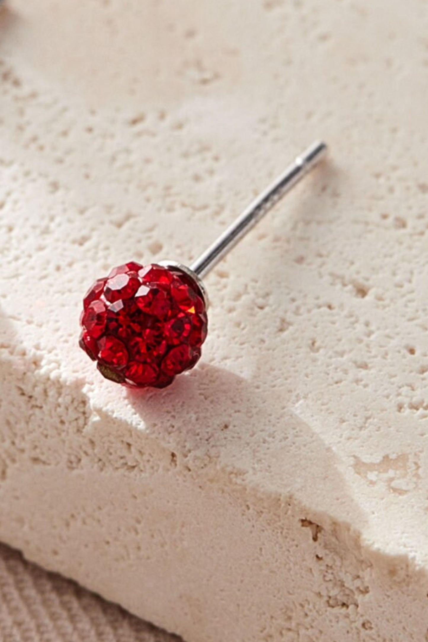 sterling-silver-cz-disco-ball-studs-in-red-closeup