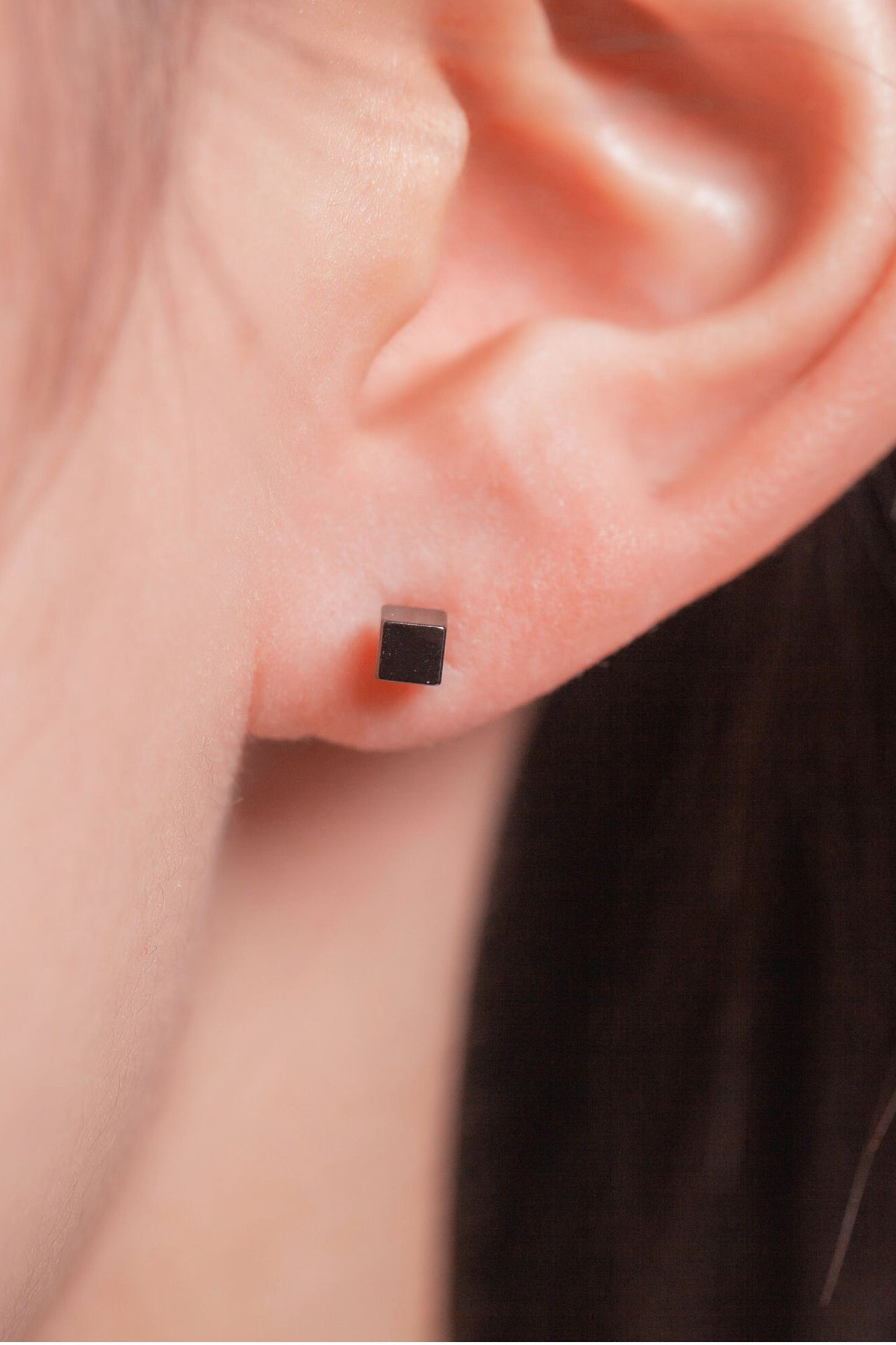 sterling-silver-3mm-square-studs-in-black-model