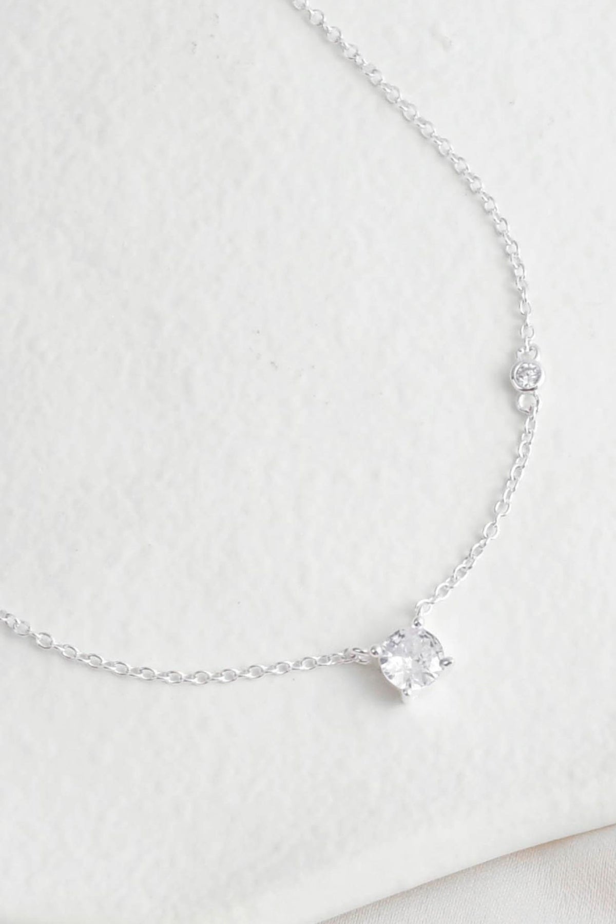 sterling-silver-asymmetical-cz-necklace-closeup
