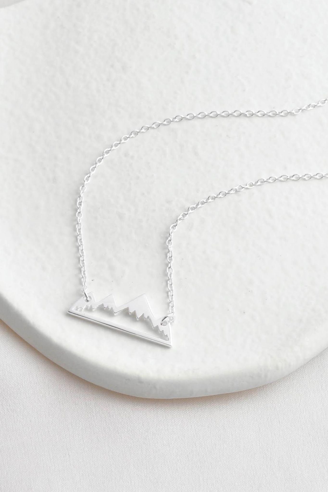 sterling-silver-snow-capped-mountain-necklace-lying-flat