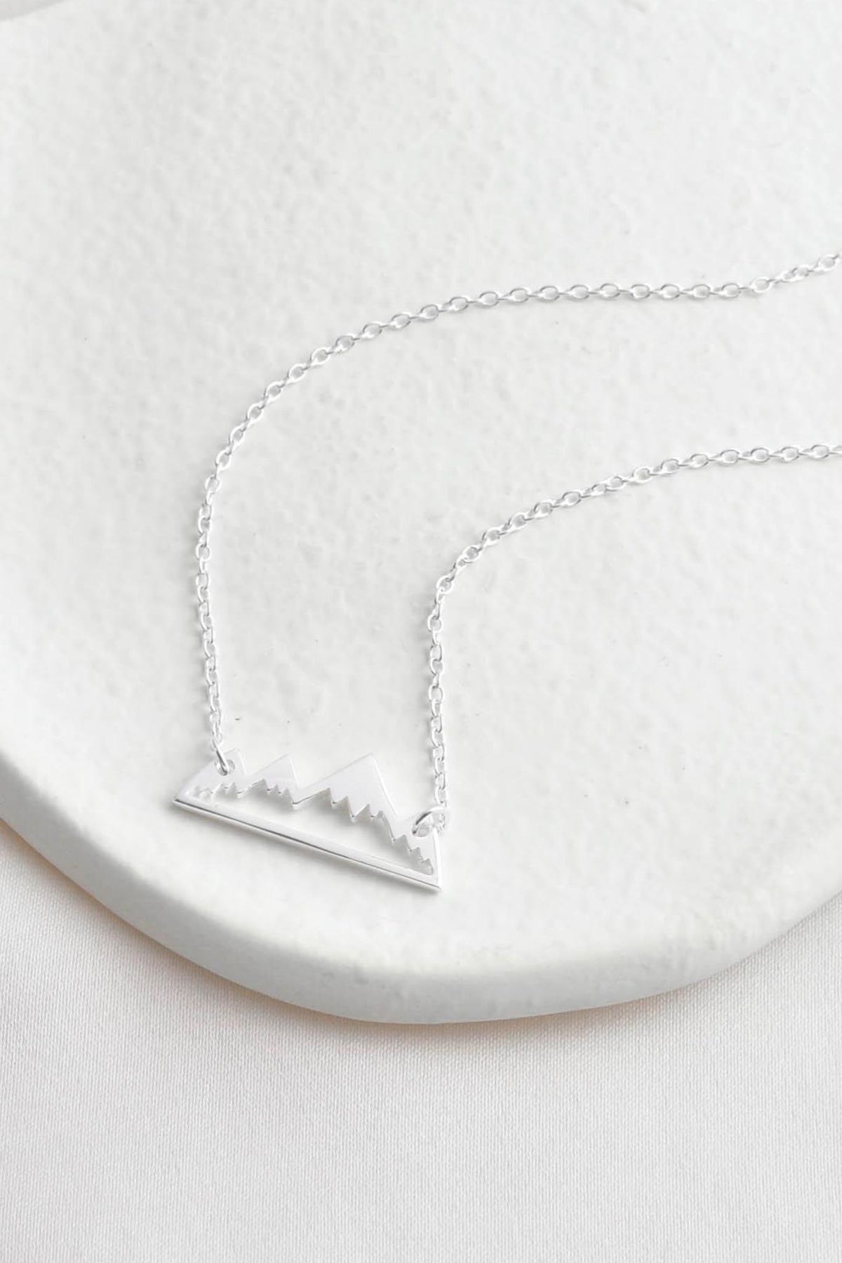 sterling-silver-snow-capped-mountain-necklace-lying-flat