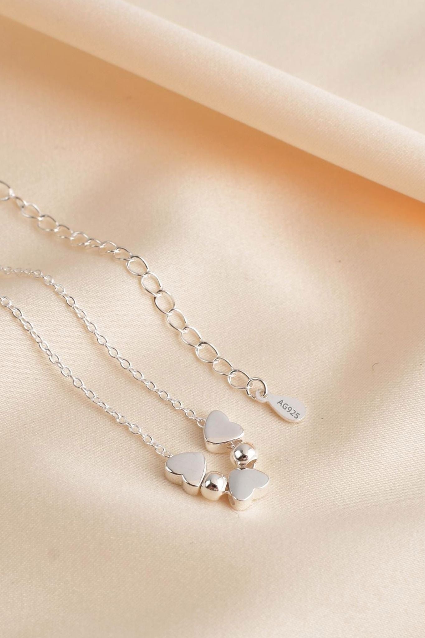 sterling-silver-triple-love-heart-beaded-necklace-closeup