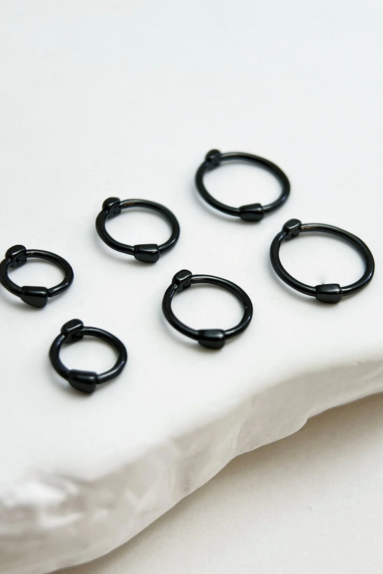 black-s999-silver-huggie-hoops-all-sizes