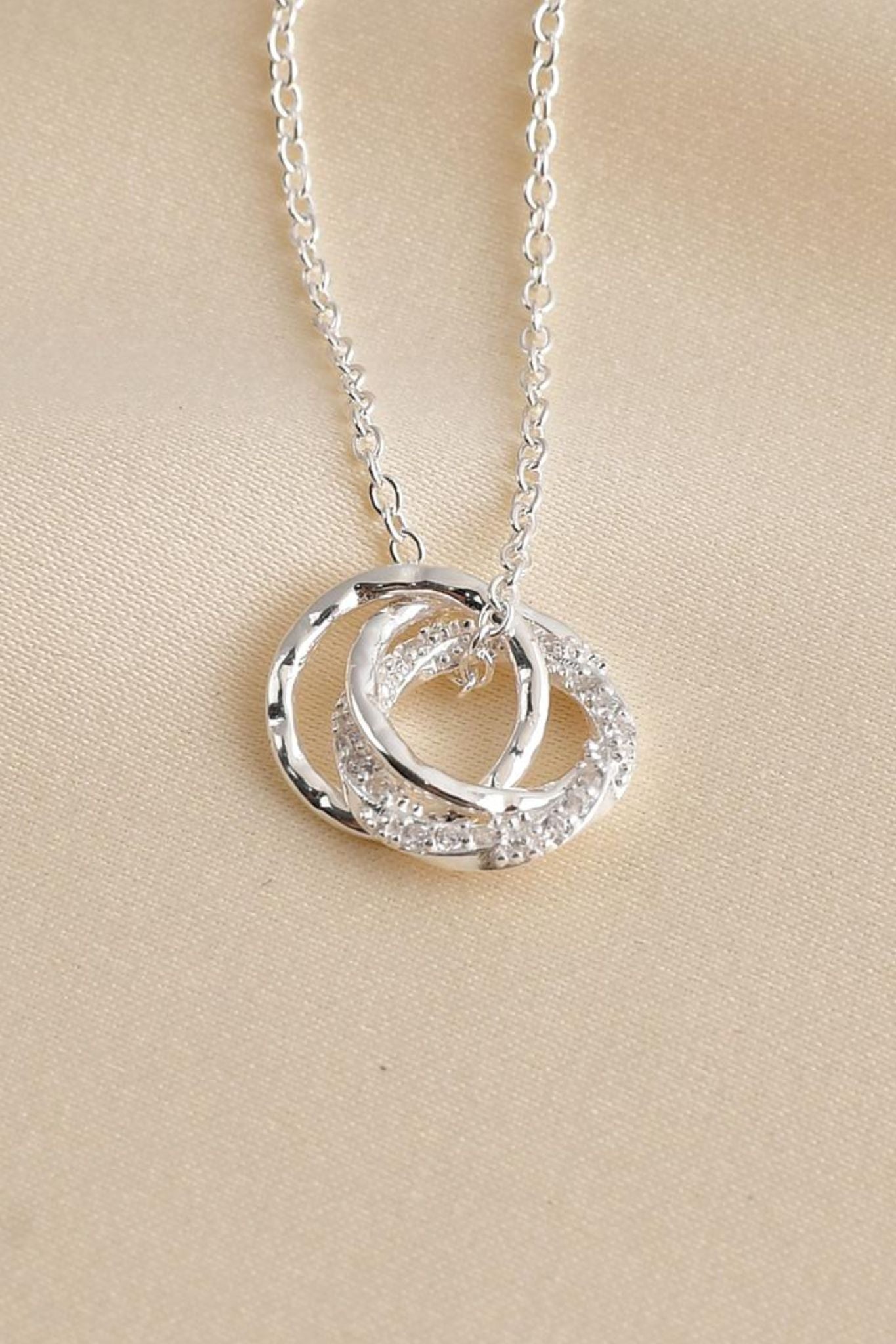 sterling-silver-cz-interlocking-rings-necklace-girlfriend-closeup