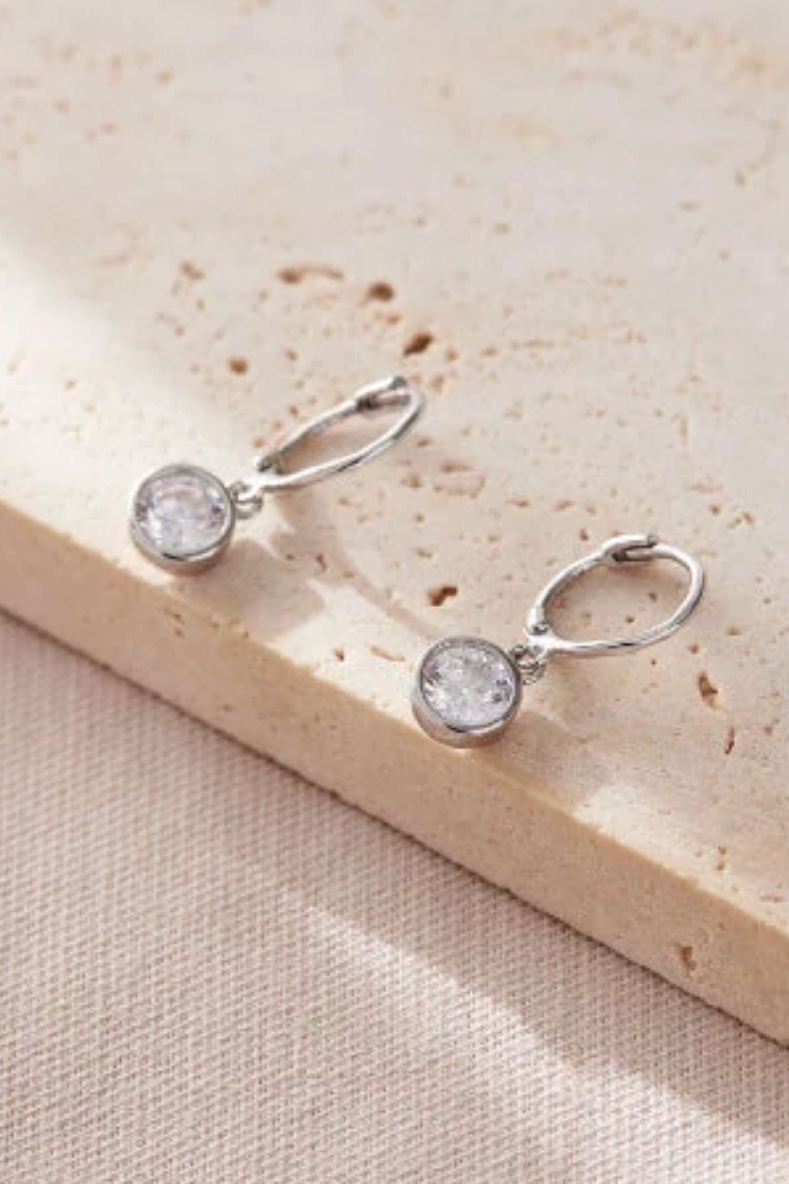 sterling-silver-cz-huggie-hoops-in-silver-white-1