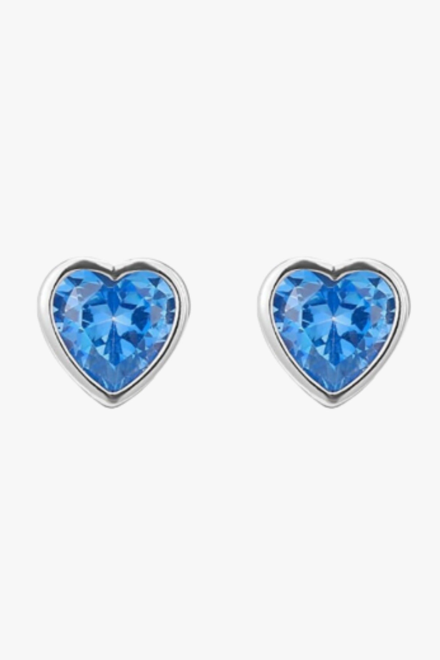 sterling-silver-cz-heart-studs-in-silver-light-blue-closeup
