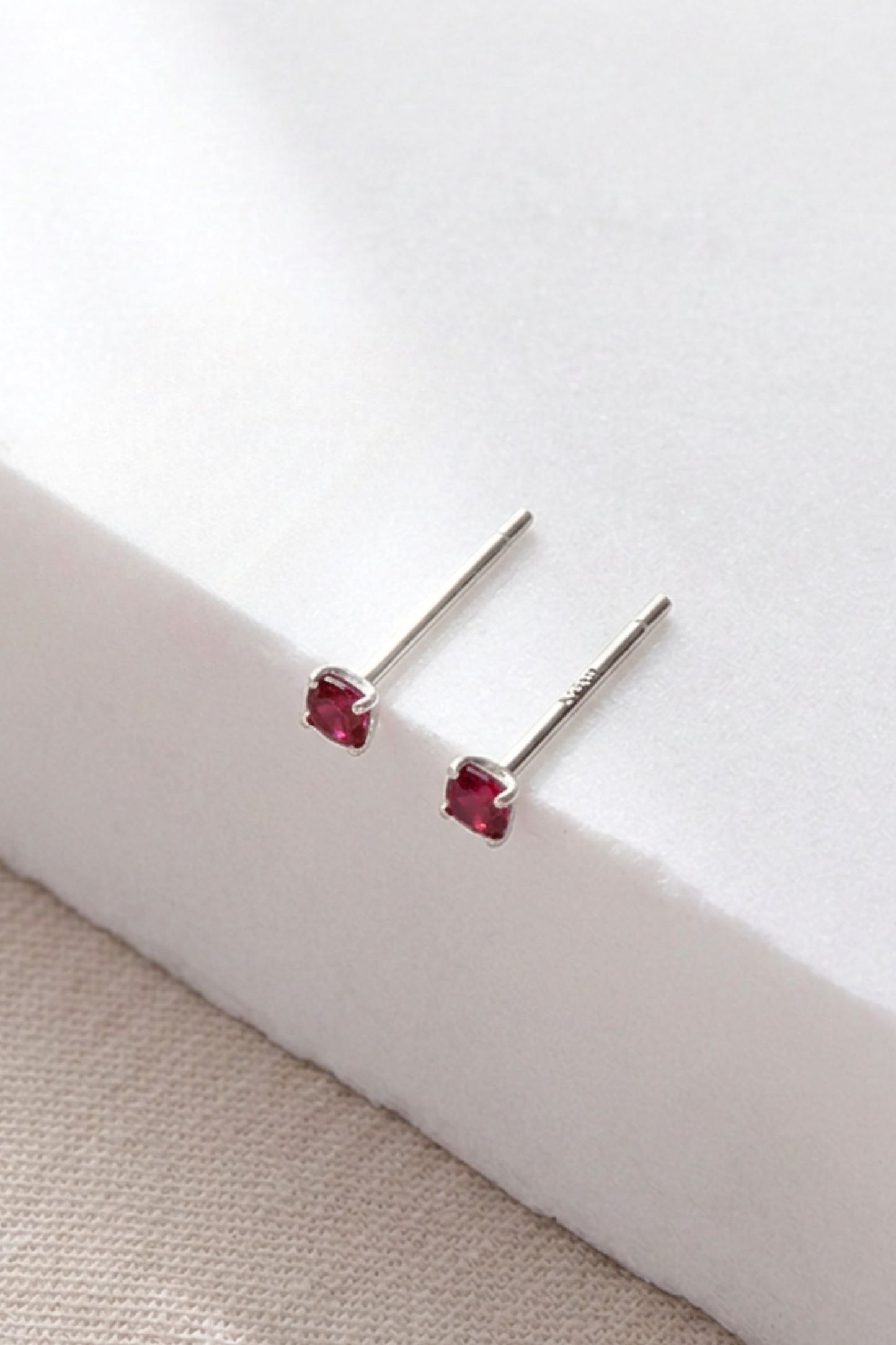 sterling-silver-cz-2-5mm-studs-in-silver-red