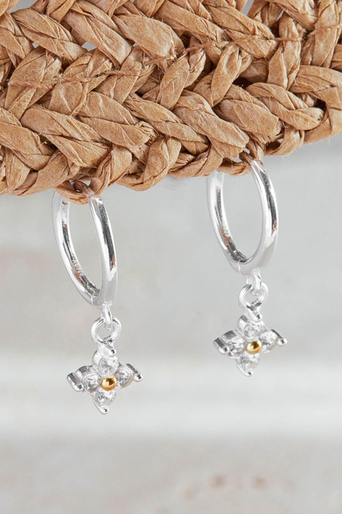 sterling-silver-cz-dainty-flower-hoops-closeup