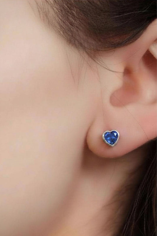 sterling-silver-cz-heart-studs-in-silver-light-blue-model
