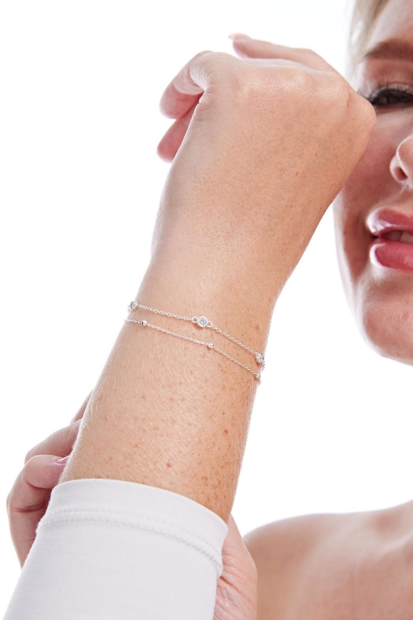 sterling-silver-round-cz-charm-bracelet-model-wrist